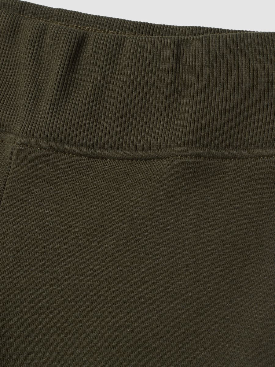 Green flared stretch cotton trousers_1