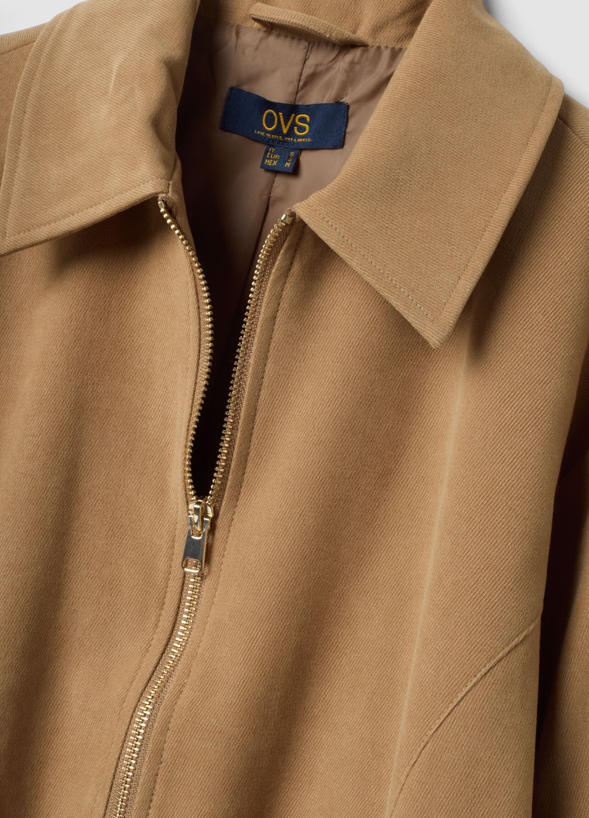 Beige stretch-fabric over-fit blazer with zip fastening