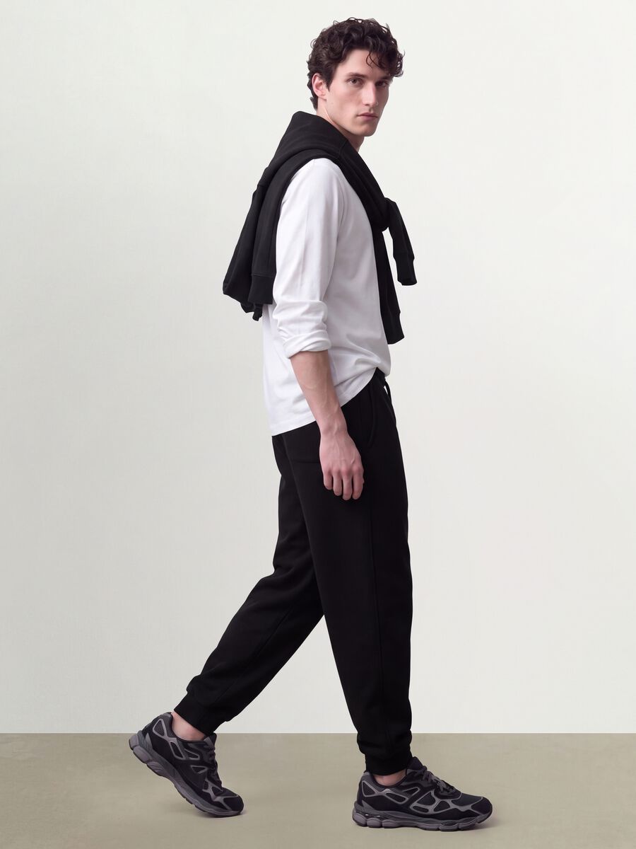 Black cotton-blend joggers with cuffed hems and drawstring waist_4
