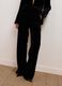 Pantaloni neri flare in tessuto elasticizzato_3