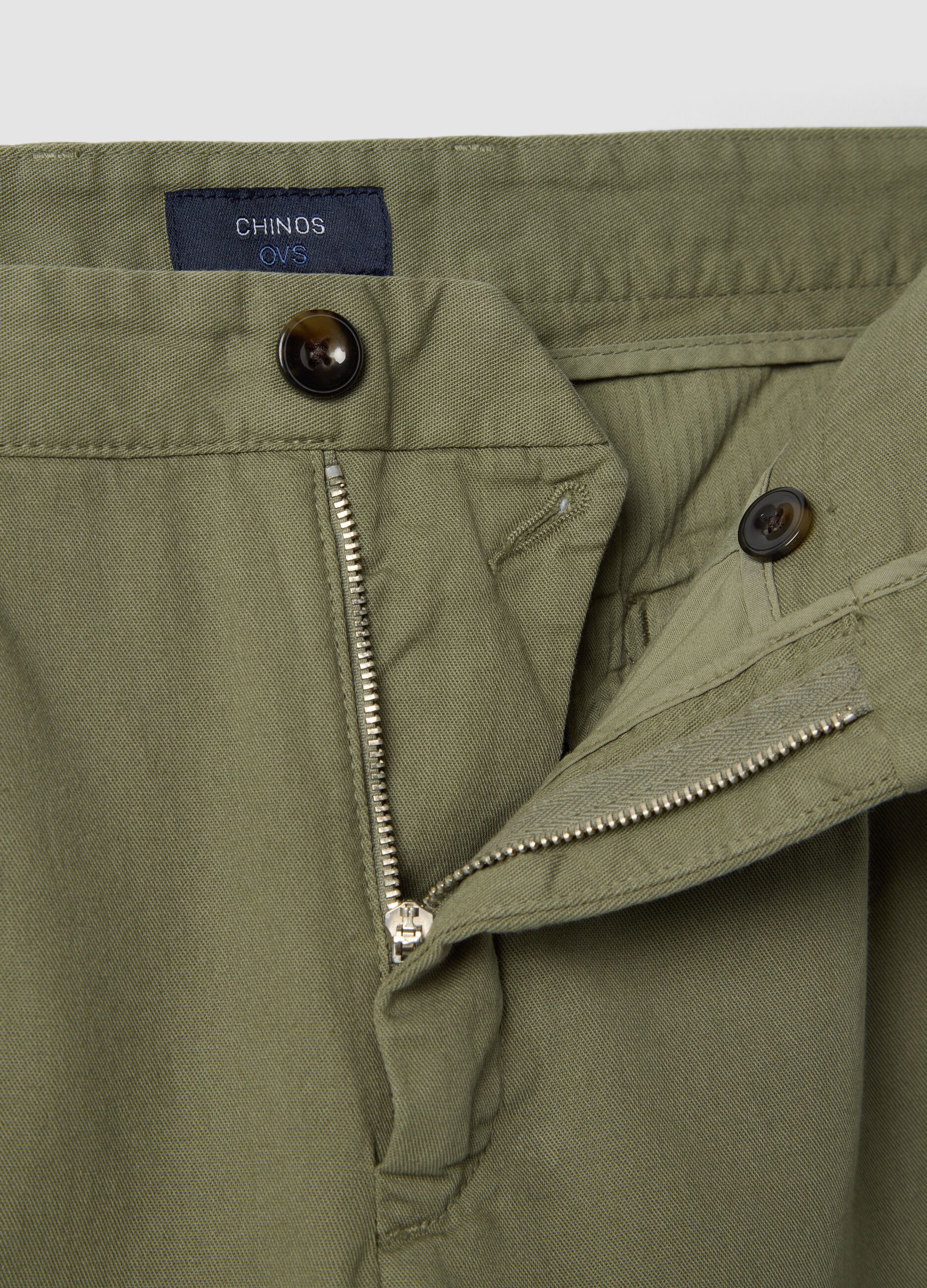 Green pure cotton carrot-fit chino trousers