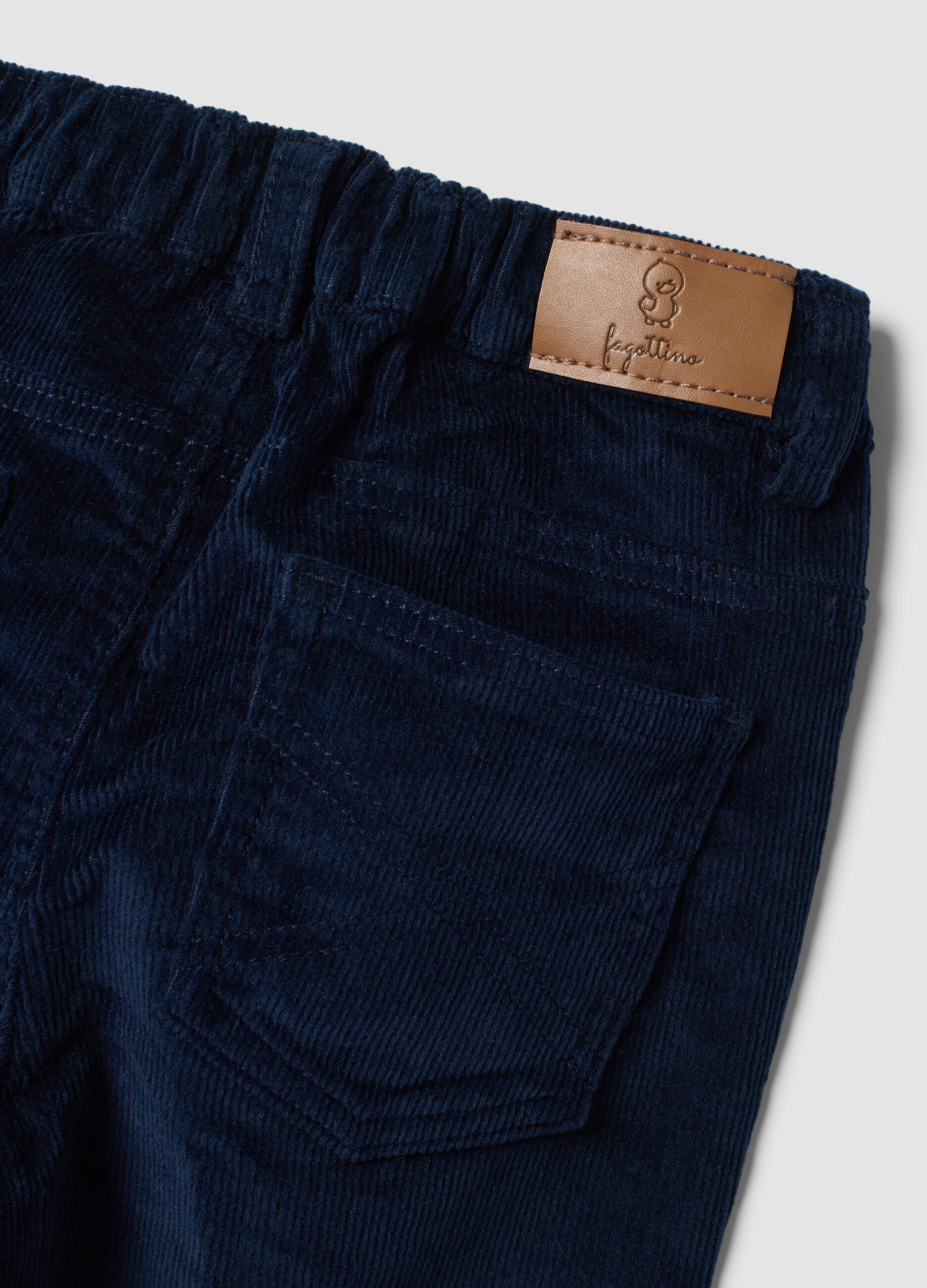 Pantaloni blu scuro in cotone elasticizzato a coste