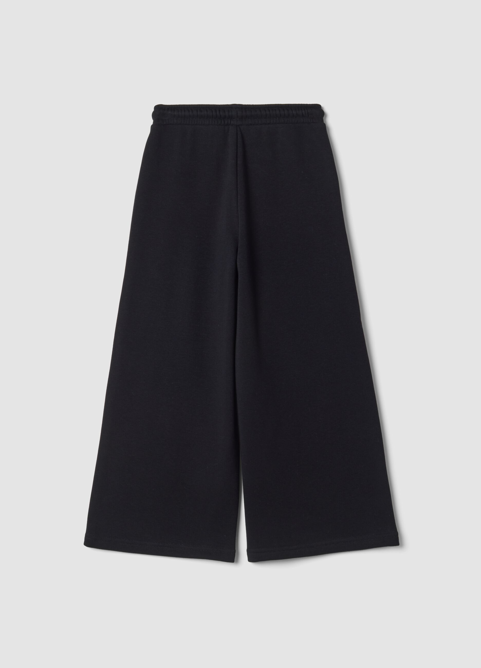 Pantaloni neri wide leg in tessuto fleece elasticizzato