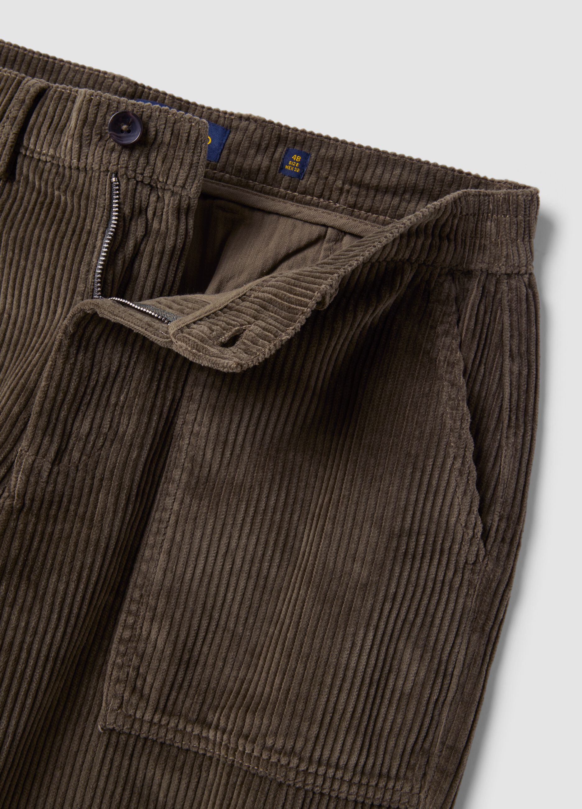 Green pure cotton corduroy carrot-fit trousers