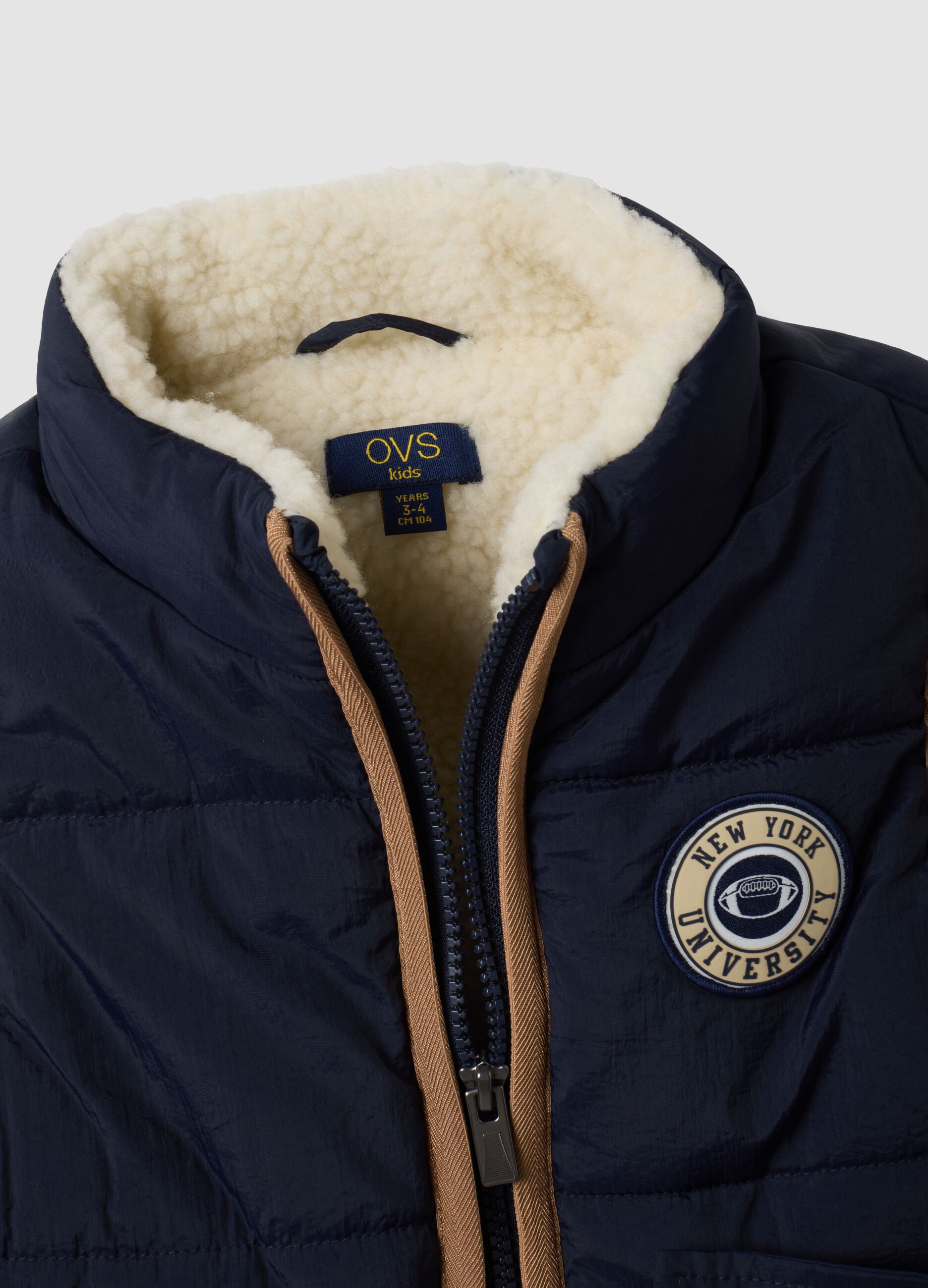 Blue padded gilet with zip and contrast trims