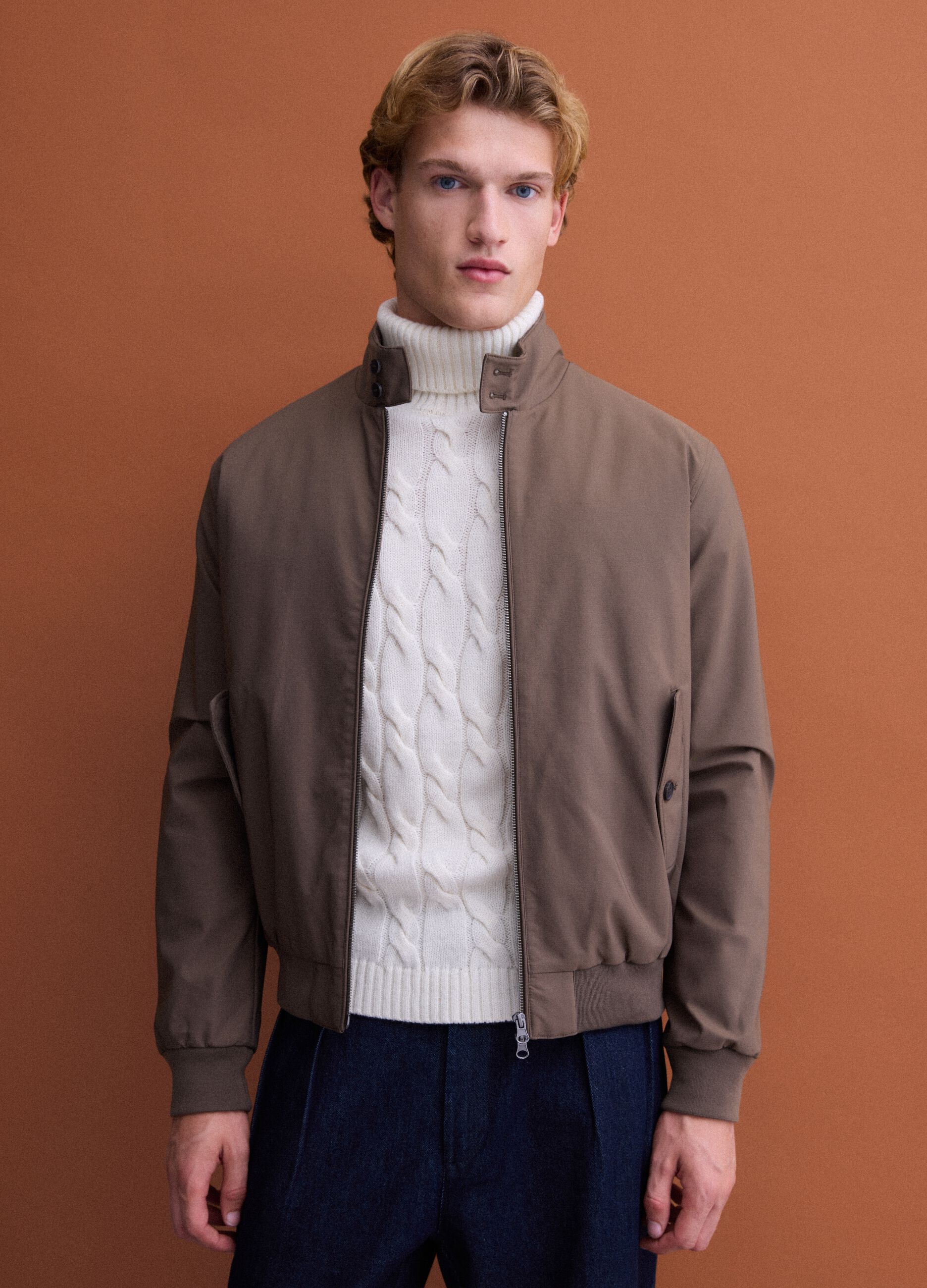 Green padded jacket in a regular fit with zip and high collar