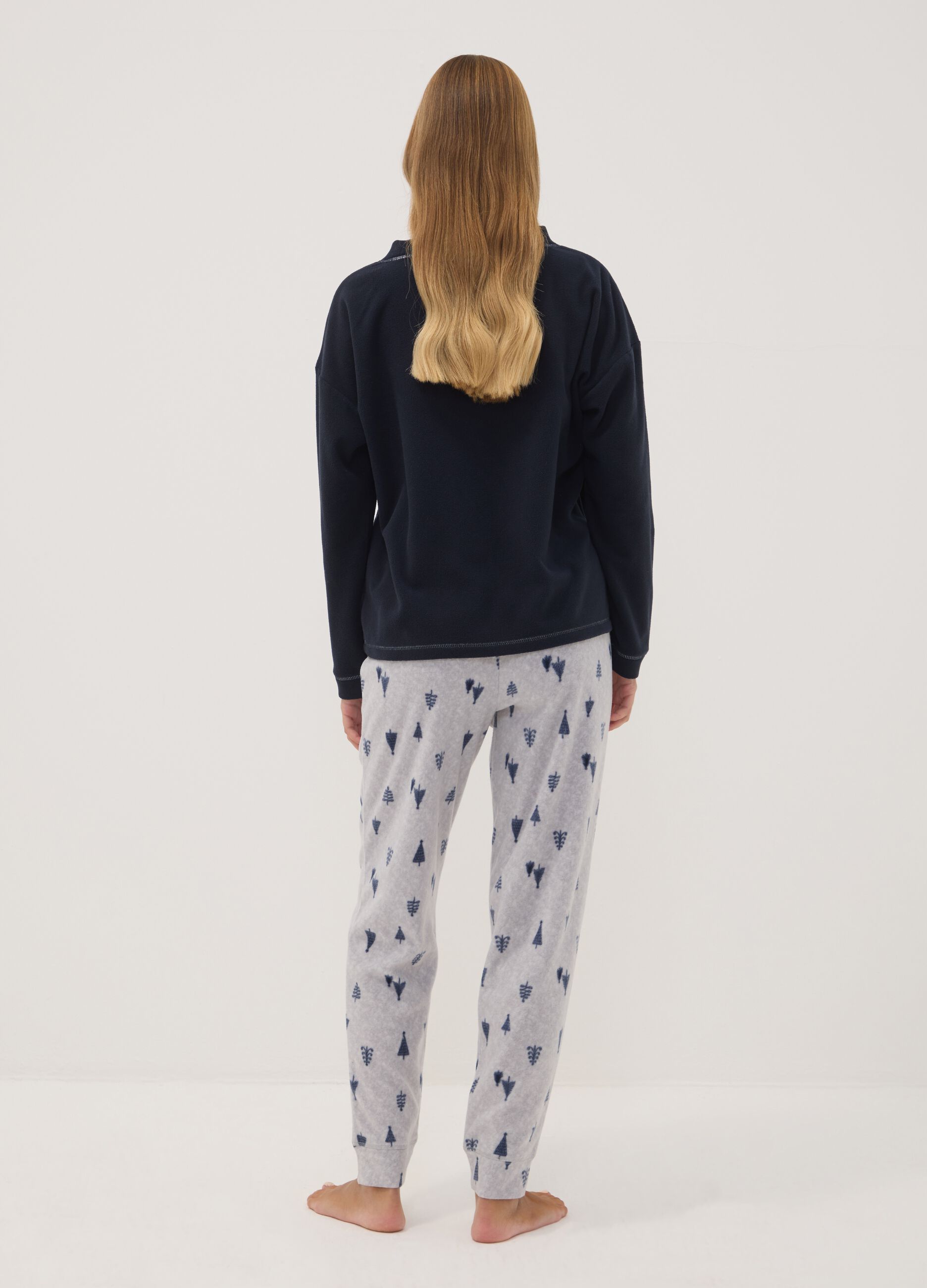Navy fleece pyjamas with crew neck top and printed trousers