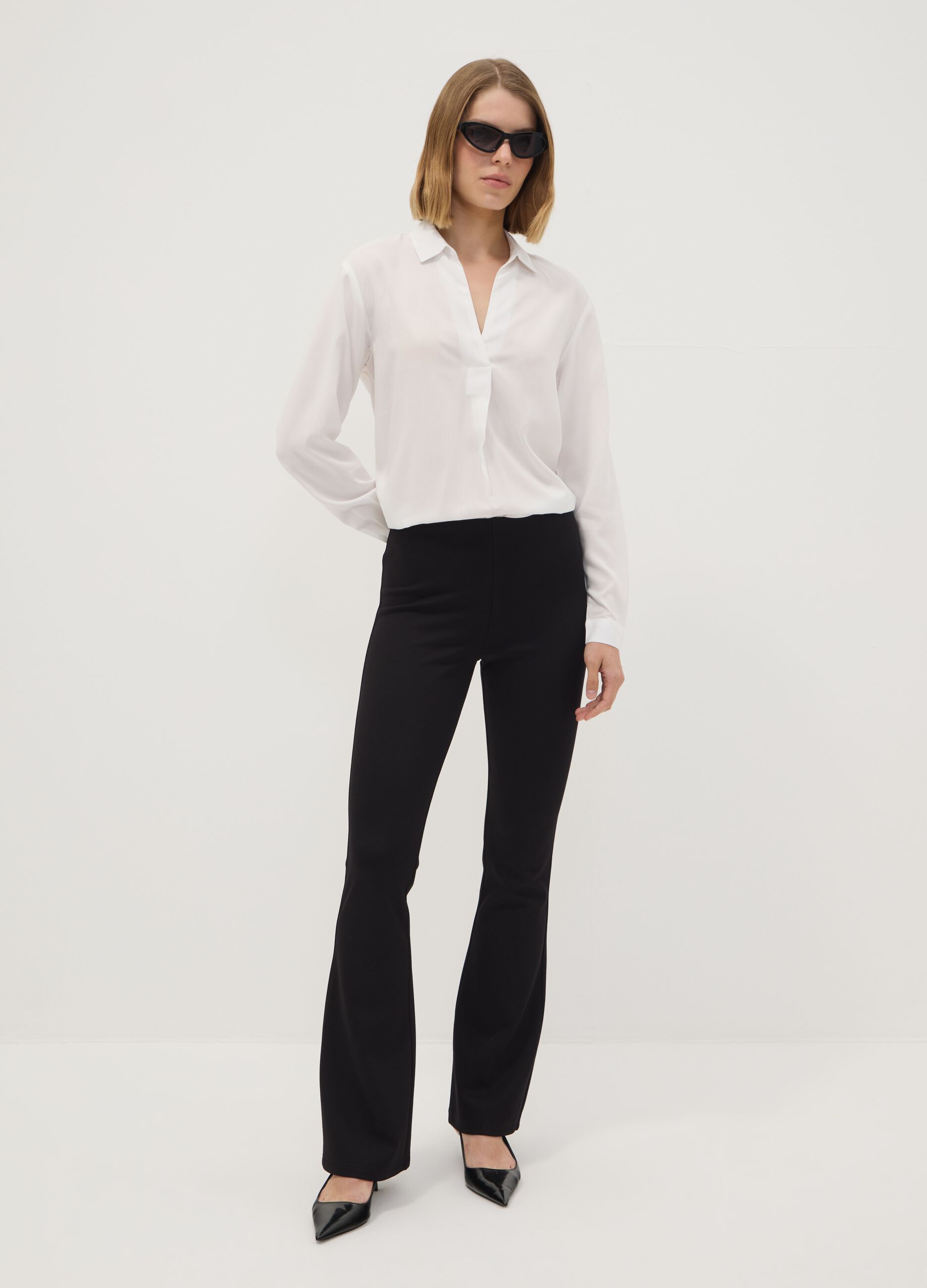 Black flared leggings in stretch viscose Milano stitch