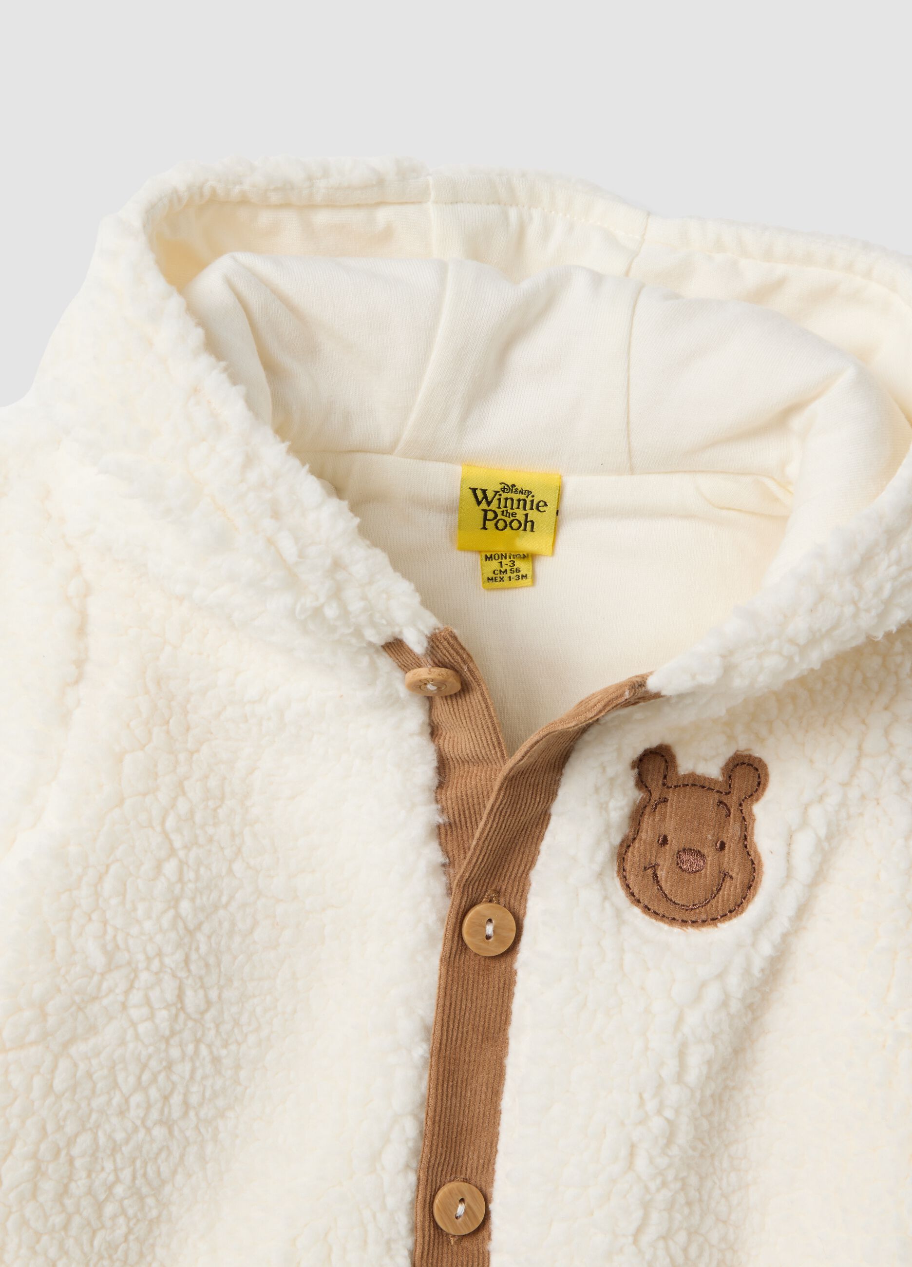 Tutina bianca con cappuccio in puro cotone organico