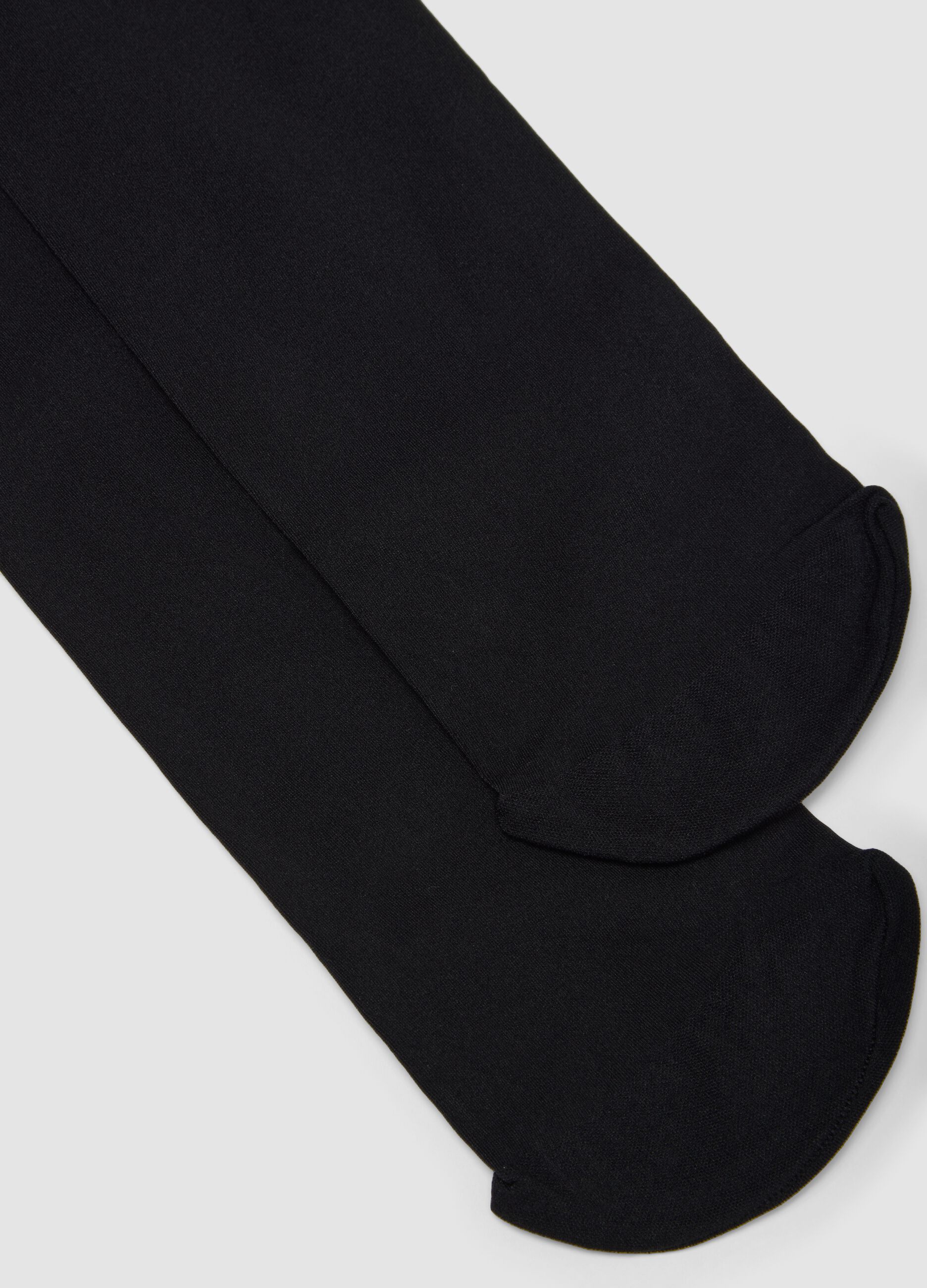 Collant neri in tessuto elasticizzato coprenti