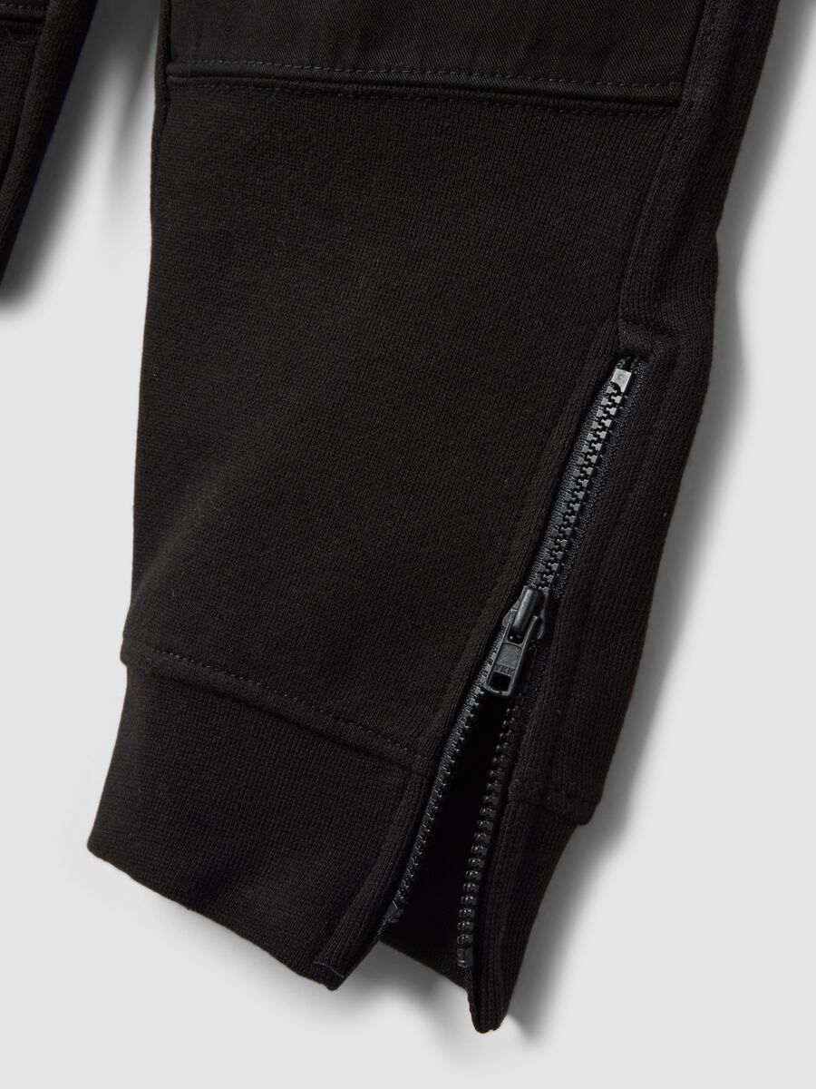 Black cotton-blend joggers with ankle zips_3