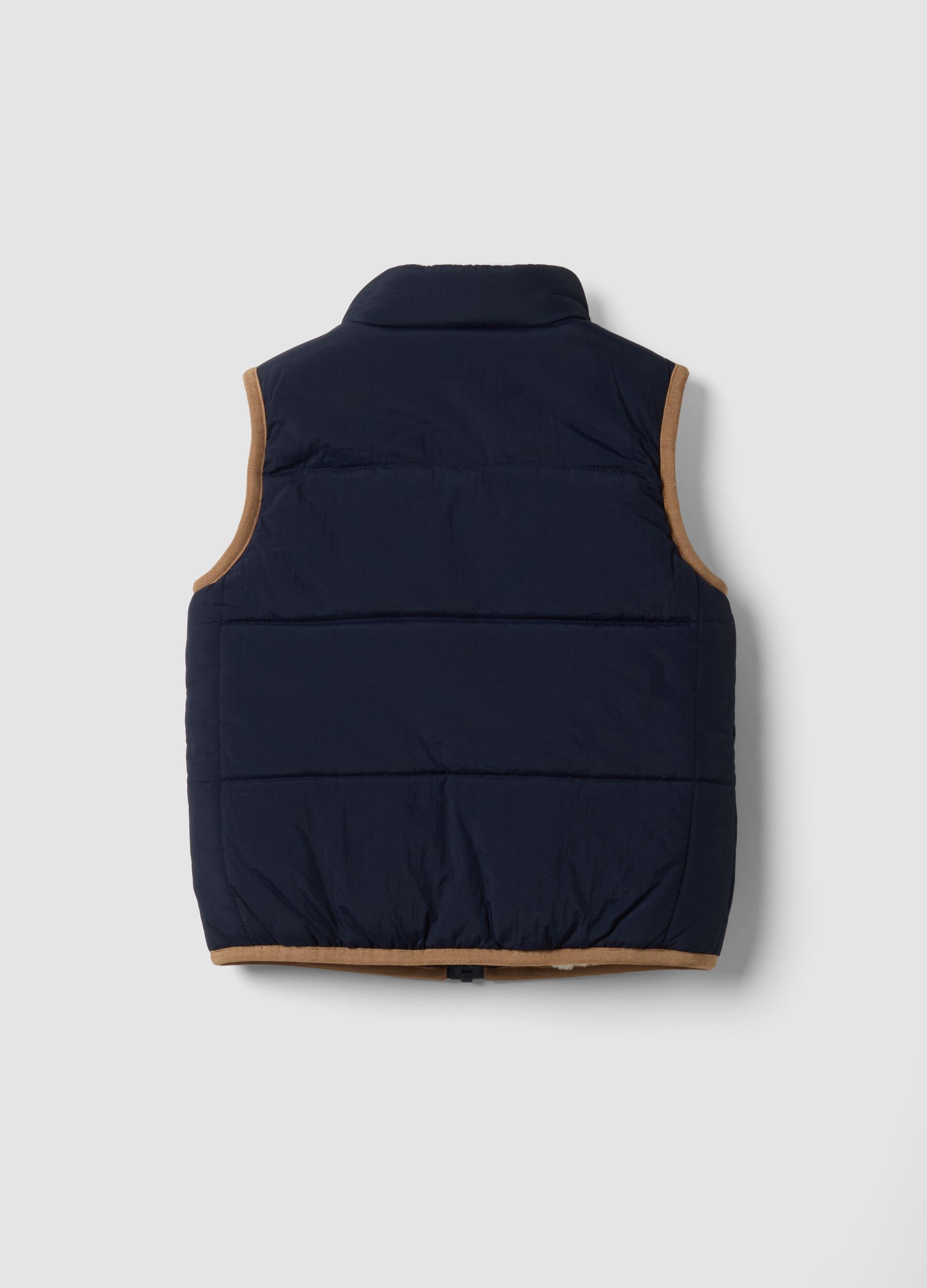 Blue padded gilet with zip and contrast trims
