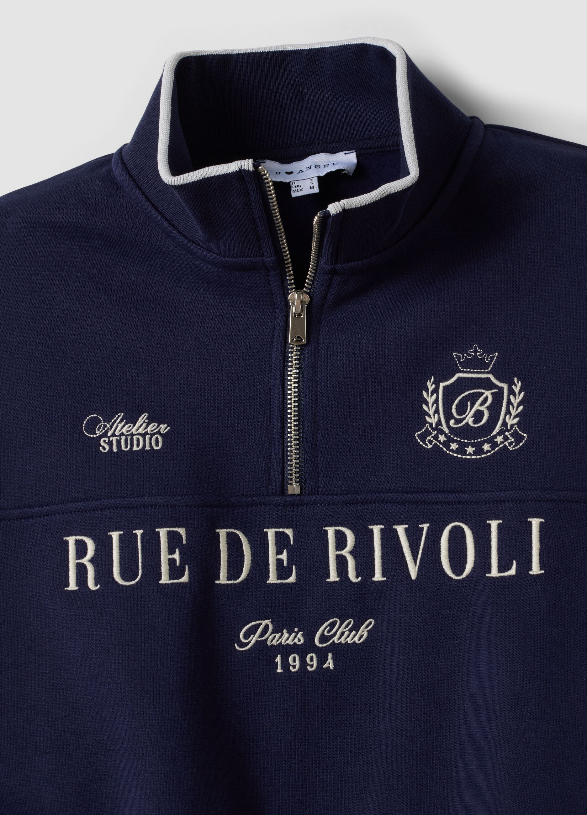 Blue half‑zip cotton‑blend sweatshirt with front lettering, regular fit