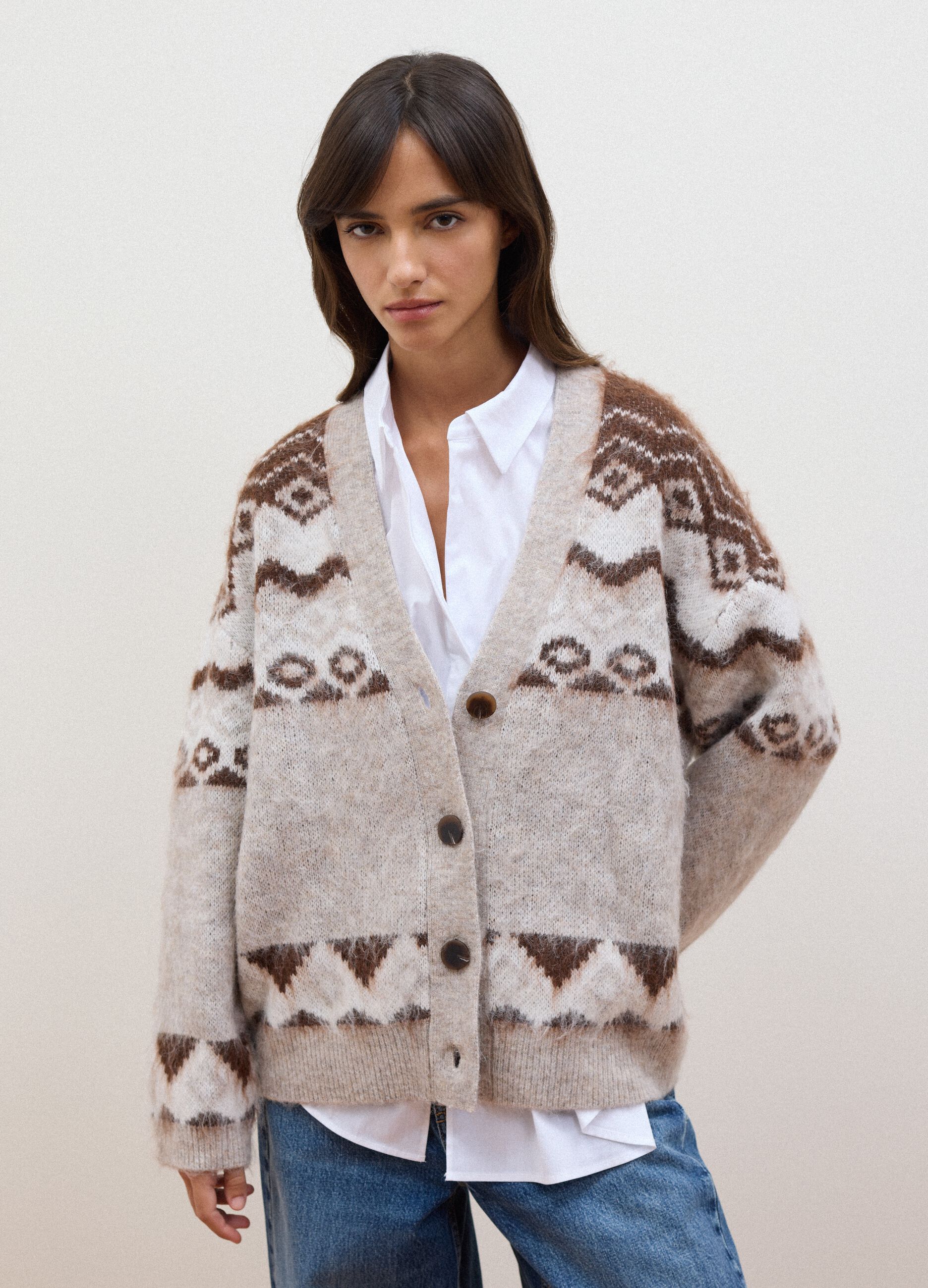 Beige wool and alpaca-blend cardigan with deep V-neck, oversized fit