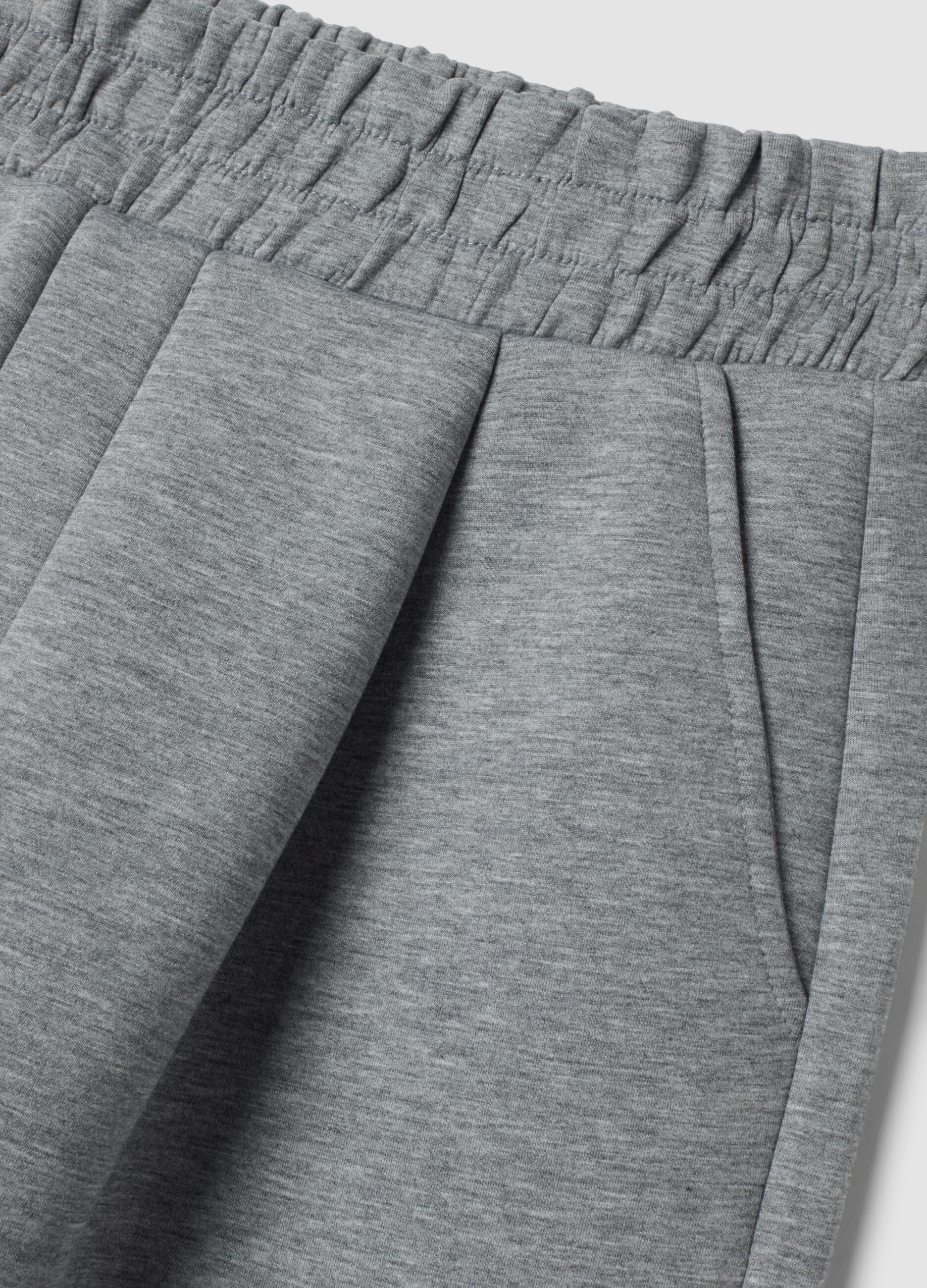 Pantaloni grigio melange in viscosa elasticizzata over fit