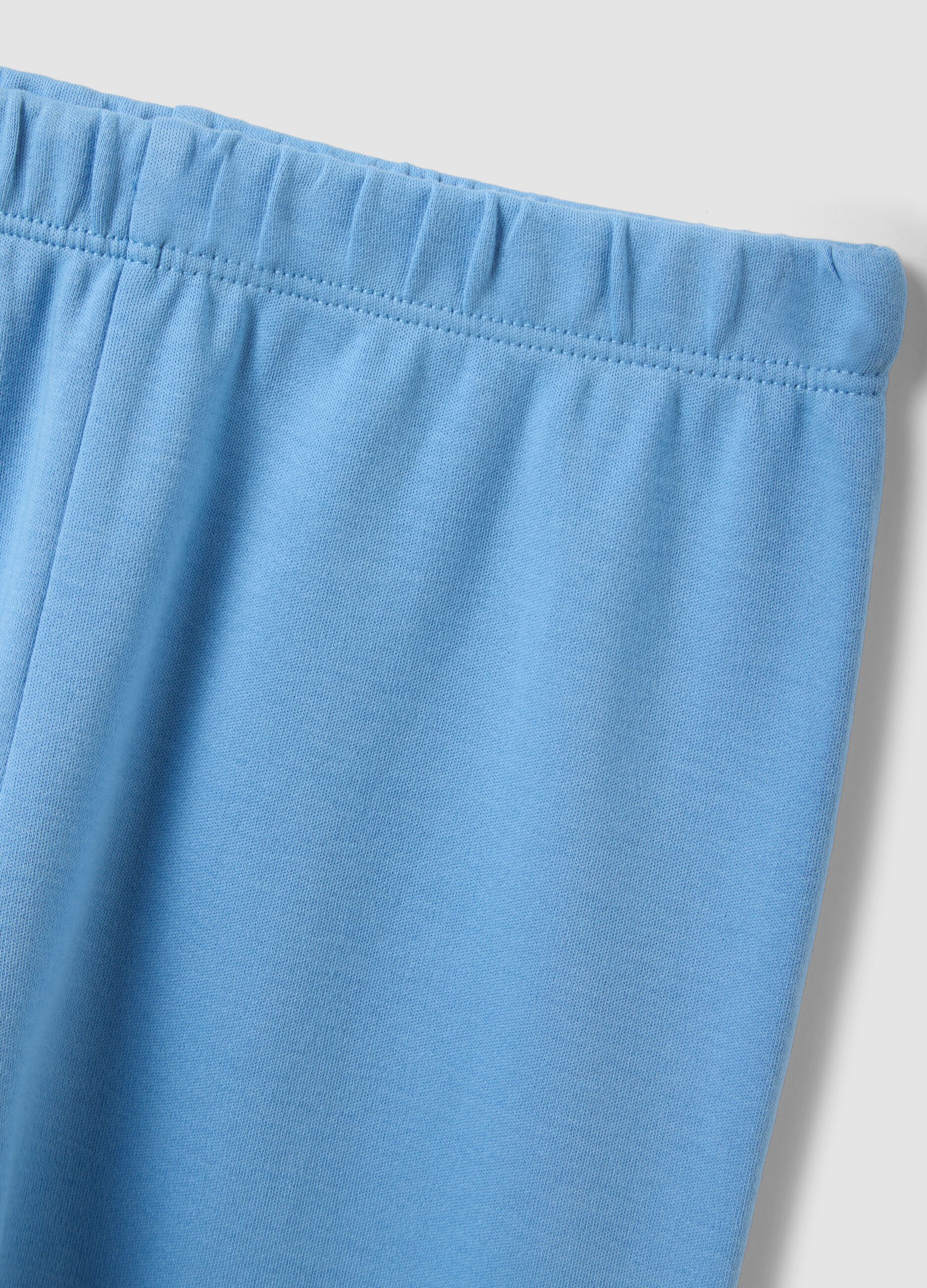Light blue organic cotton pyjamas with biscuit print