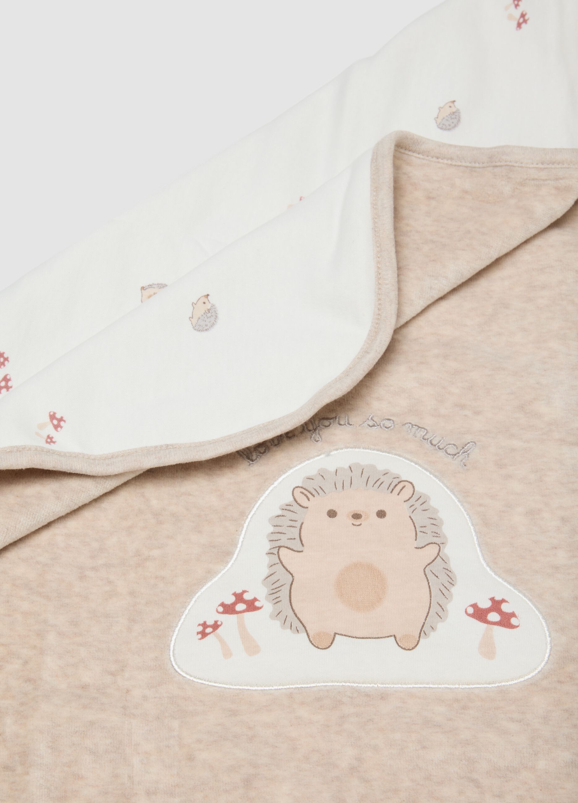Beige organic cotton-blend baby blanket with hedgehog embroidery