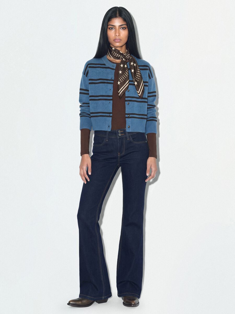 Jeans blu flare in cotone elasticizzato_0