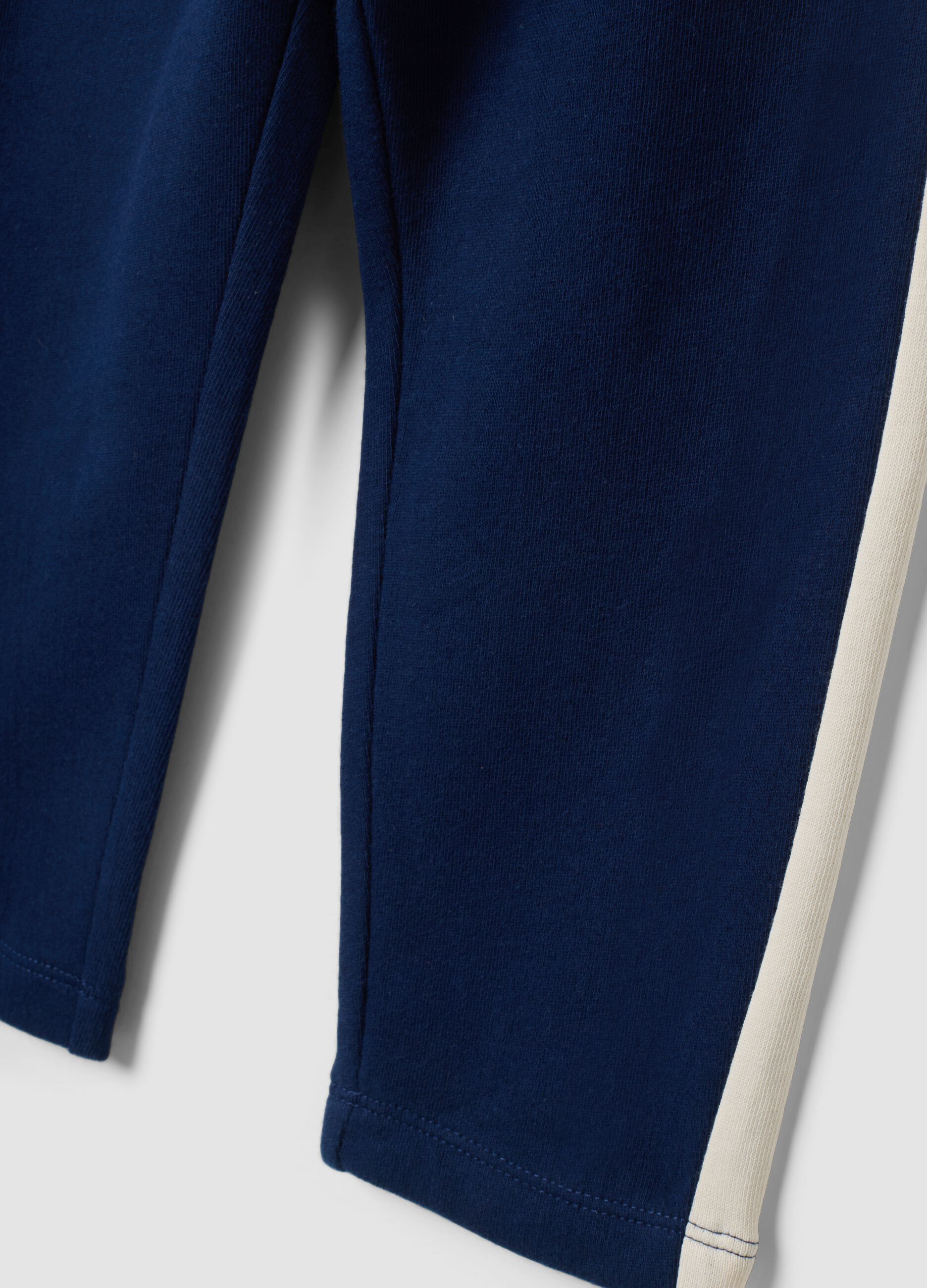 Blue organic cotton joggers with contrast side stripes