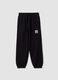 Pantaloni jogger neri in puro cotone con fondo elastico_0