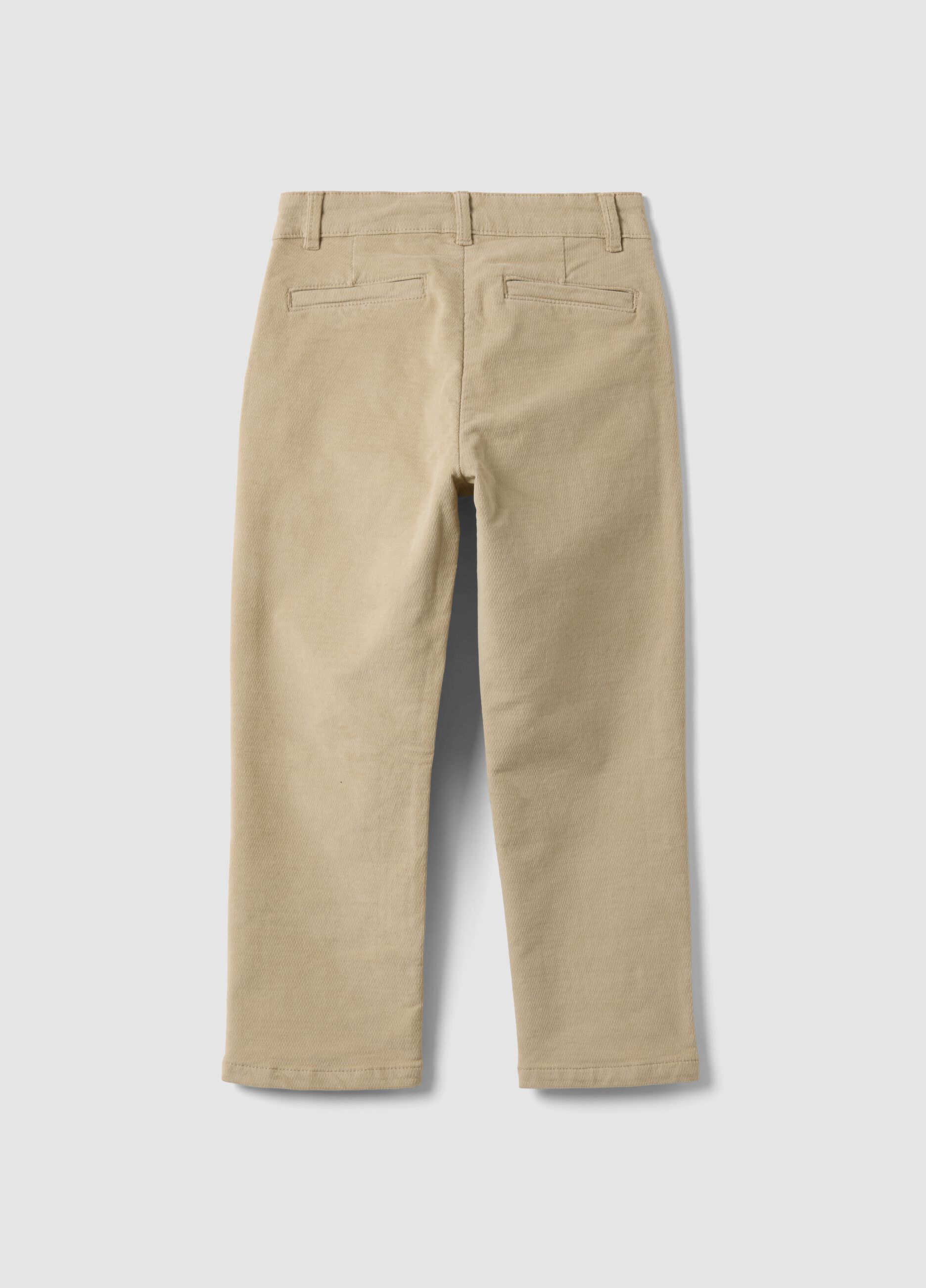 Pantaloni chino beige in cotone elasticizzato a coste
