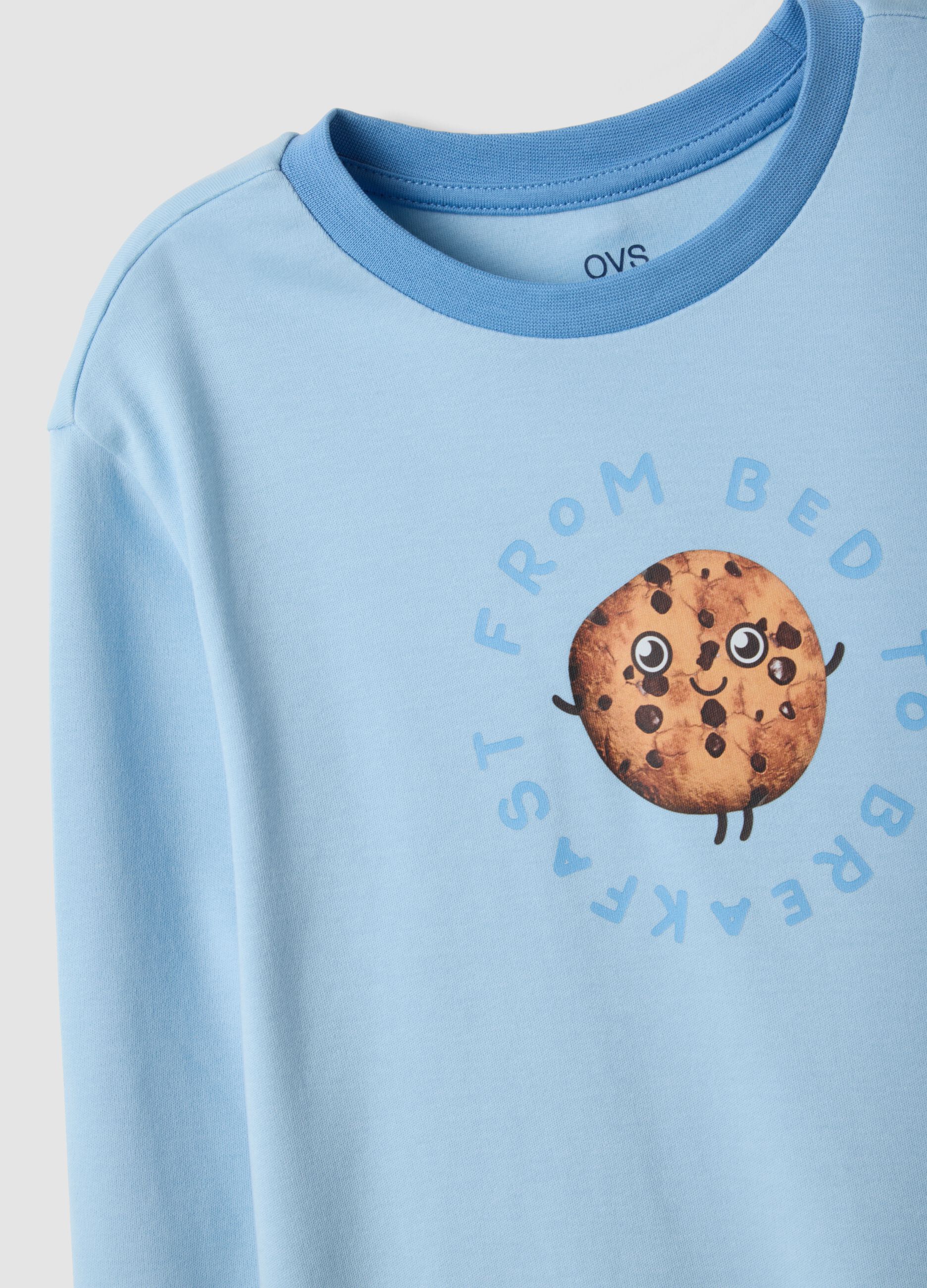 Light blue organic cotton pyjamas with biscuit print