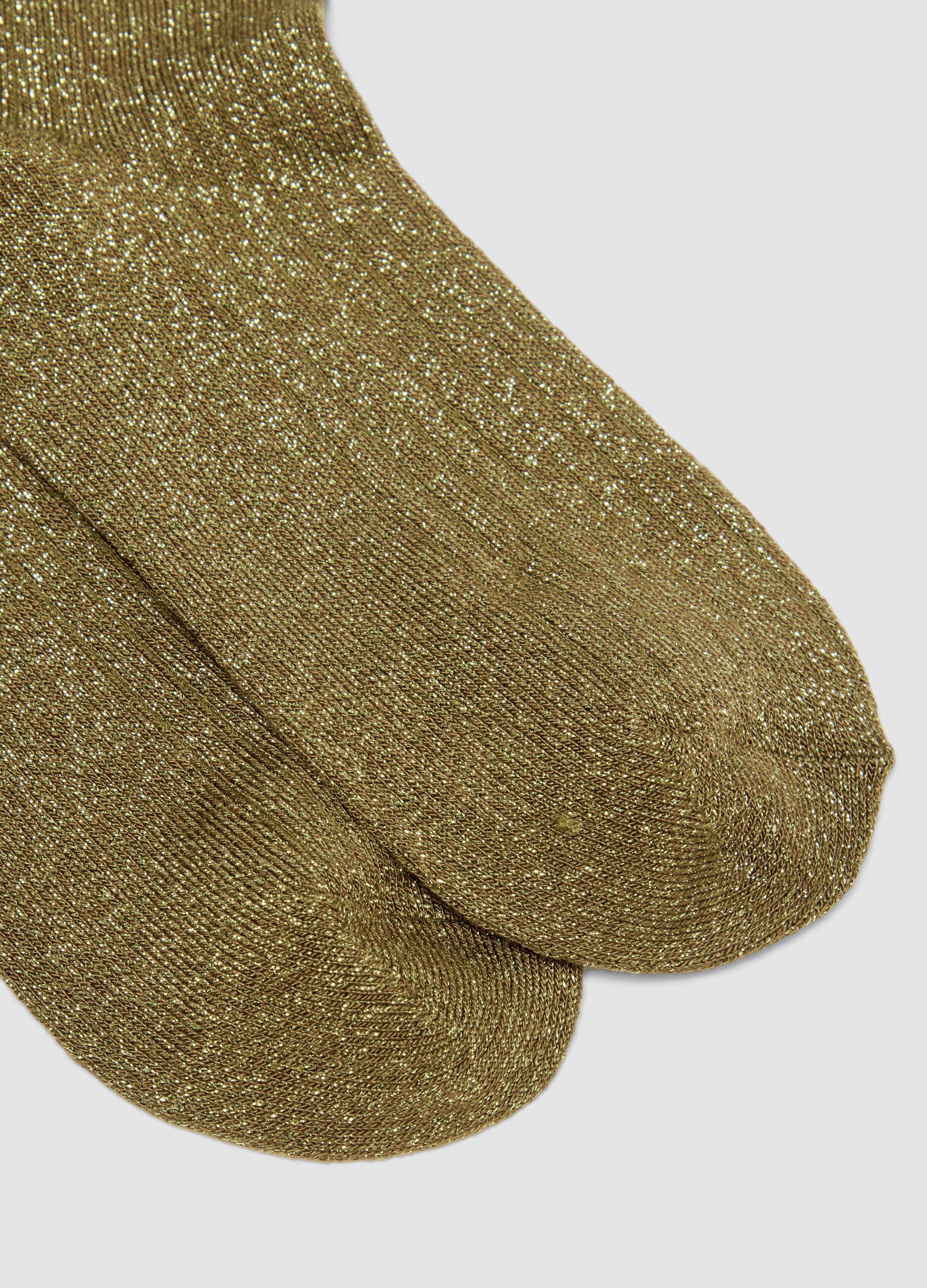 Green stretch-knit socks with lurex yarn