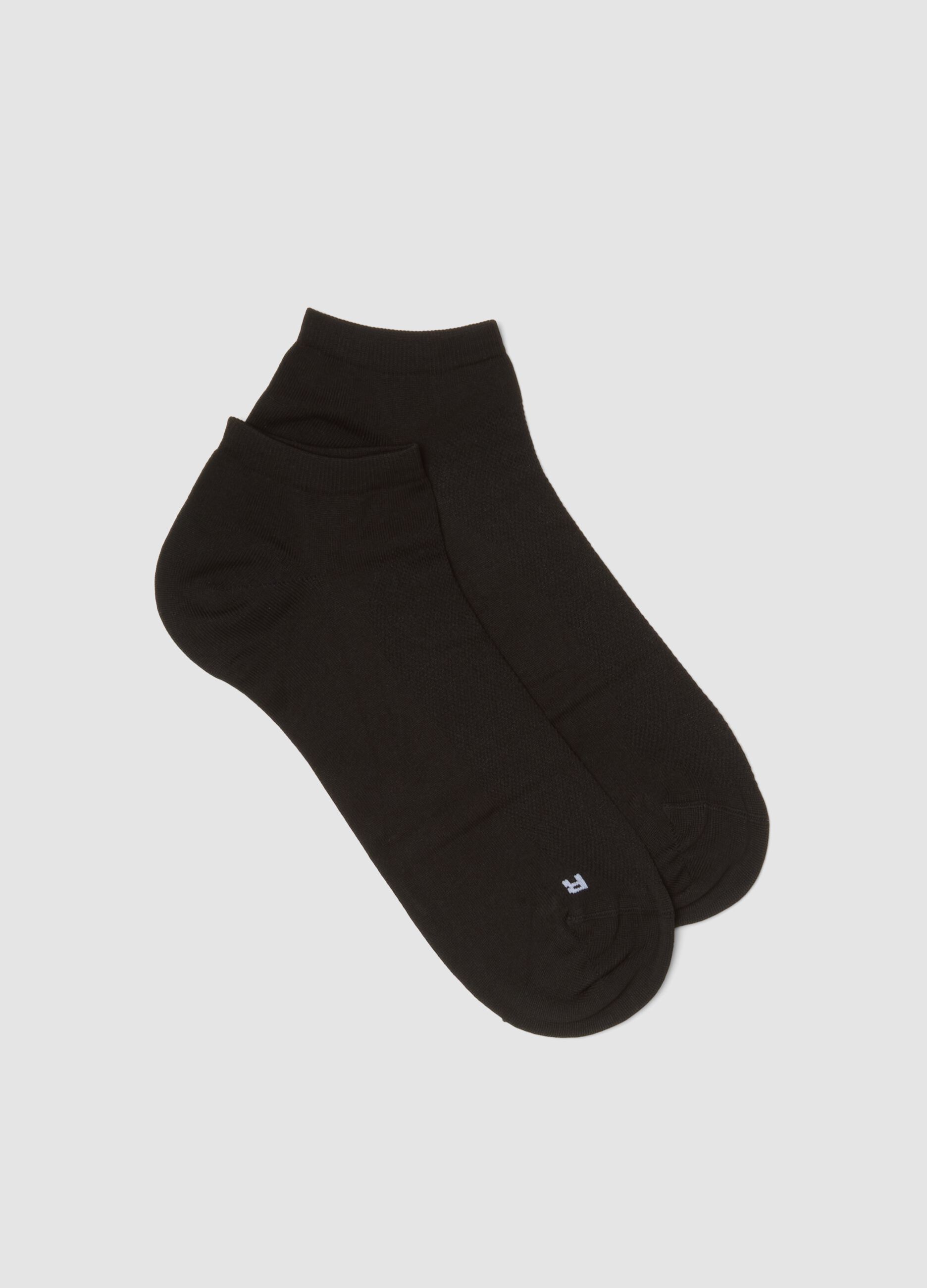Calze sportive nere alla caviglia in tessuto elasticizzato