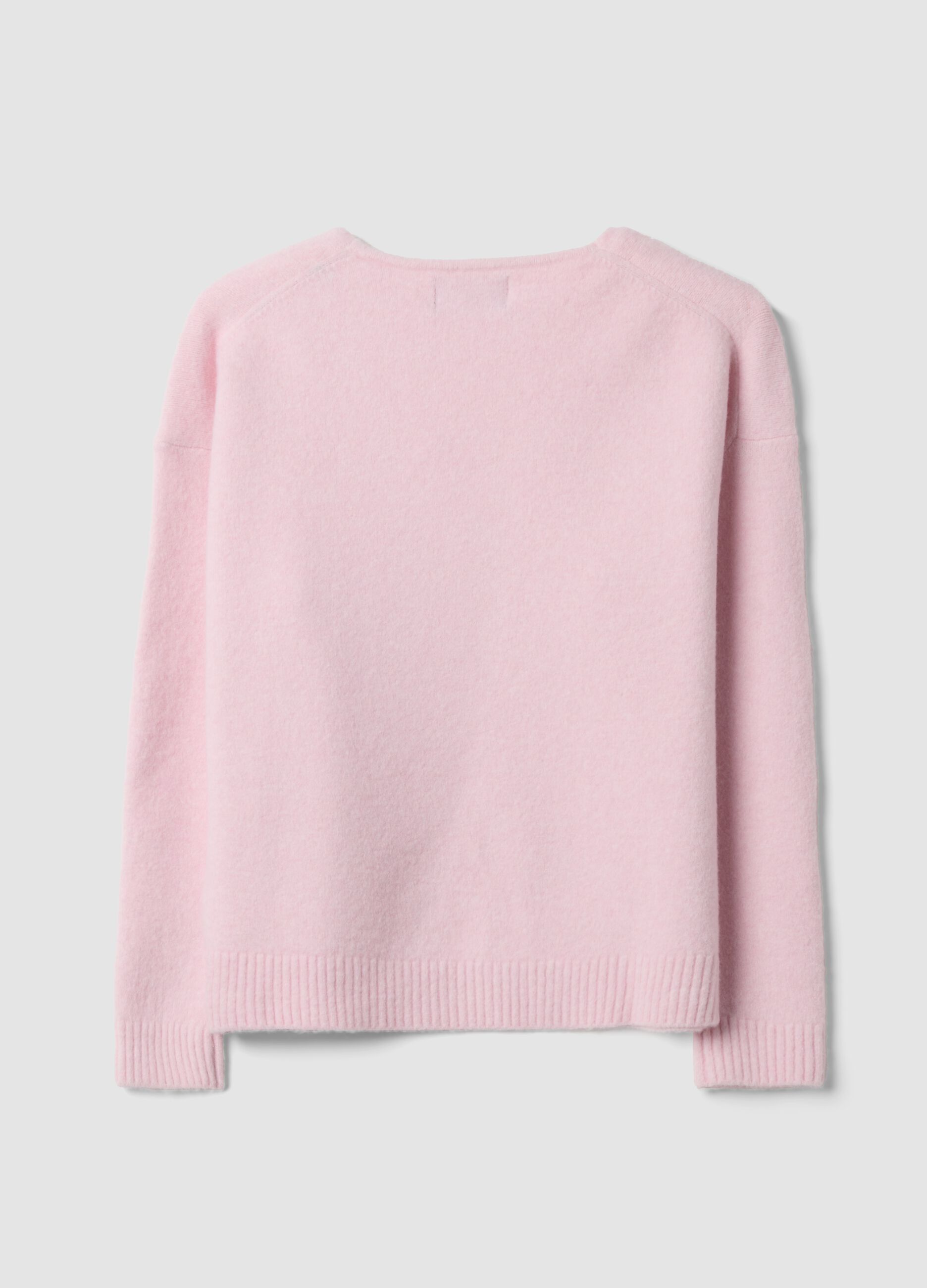 Pink stretch wool jumper with deep V-neck and oversized fit