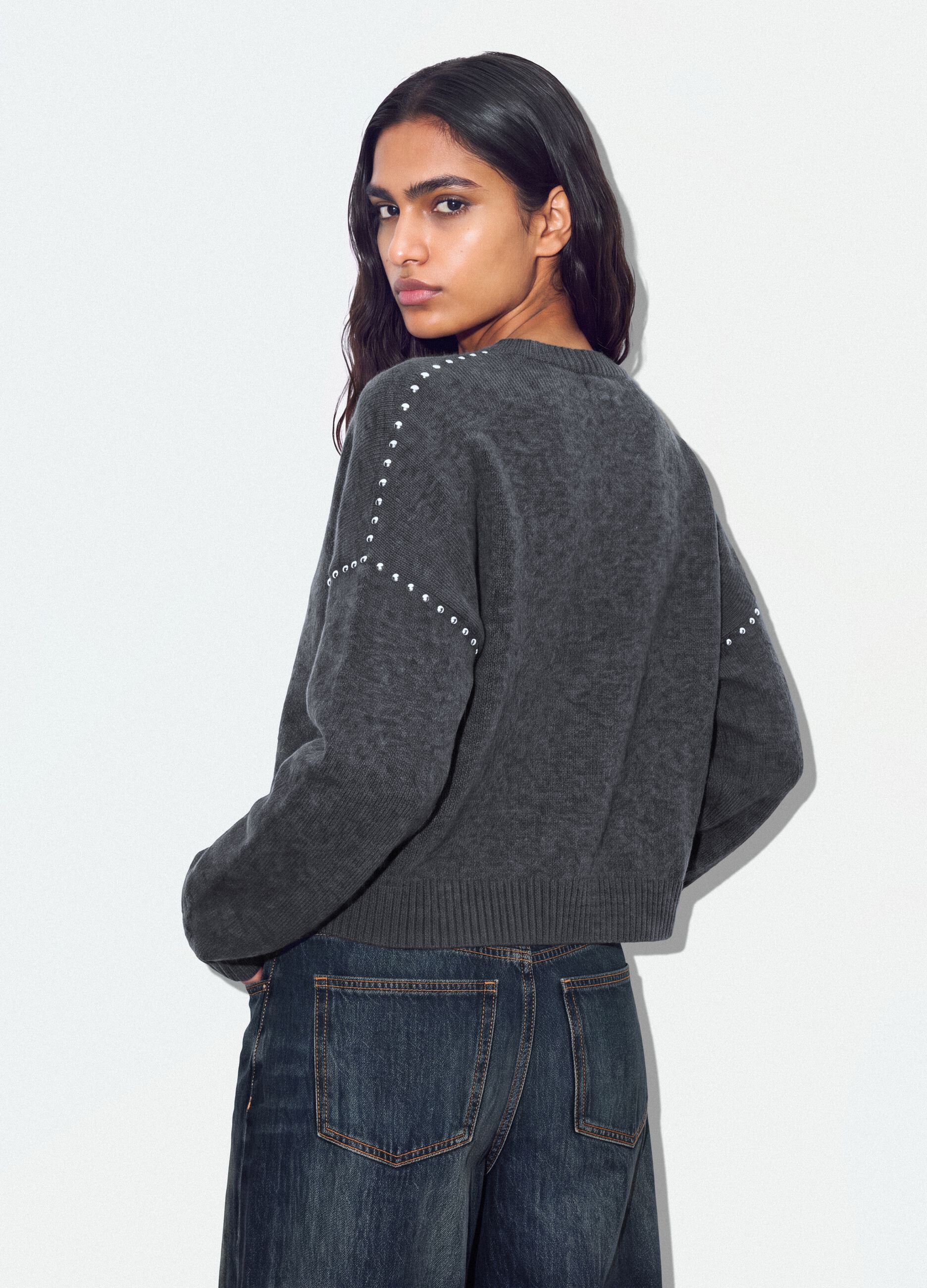 Grey stretch wool jumper with studded trims