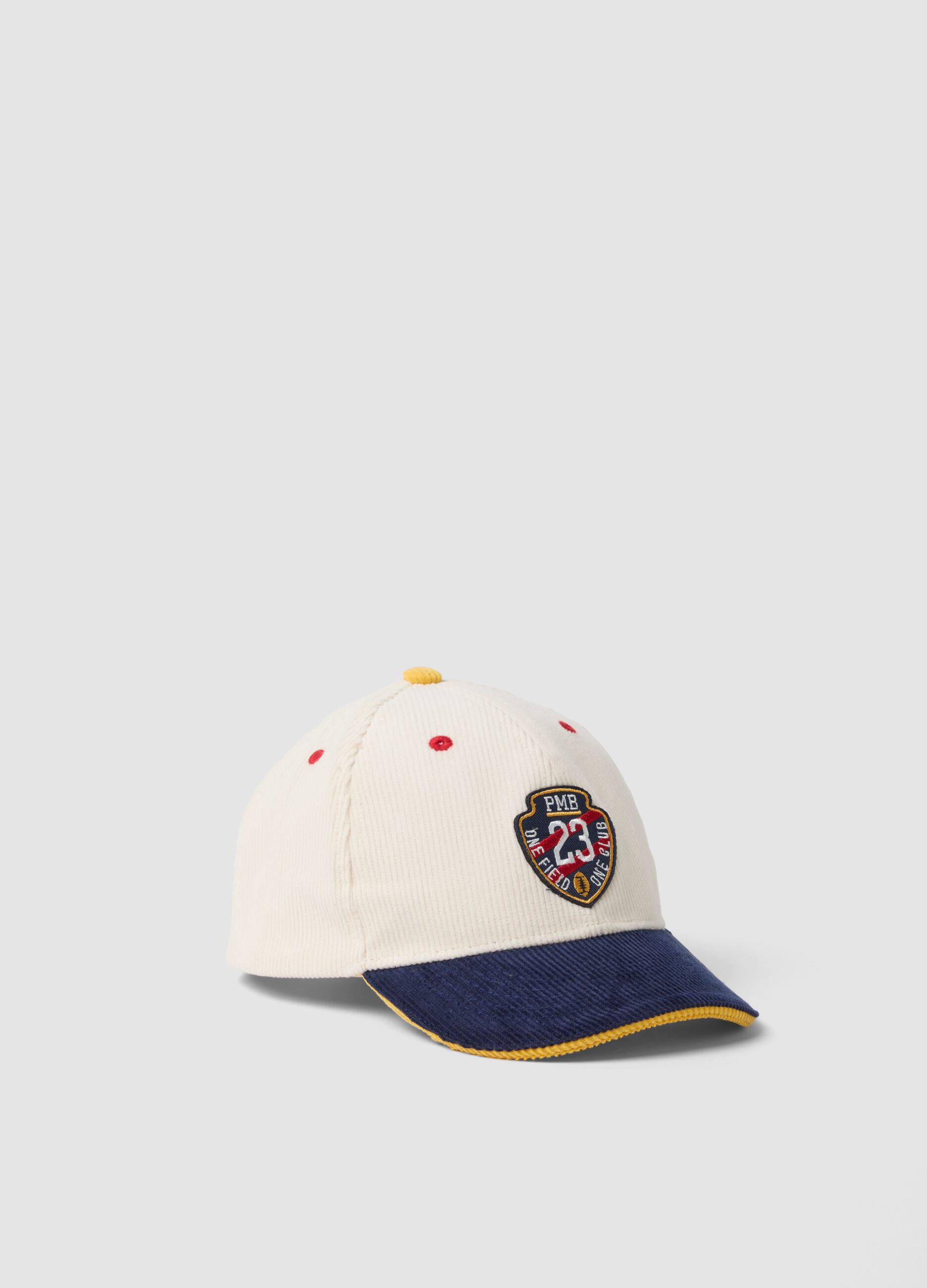 Beige pure cotton cap with blue peak and patch