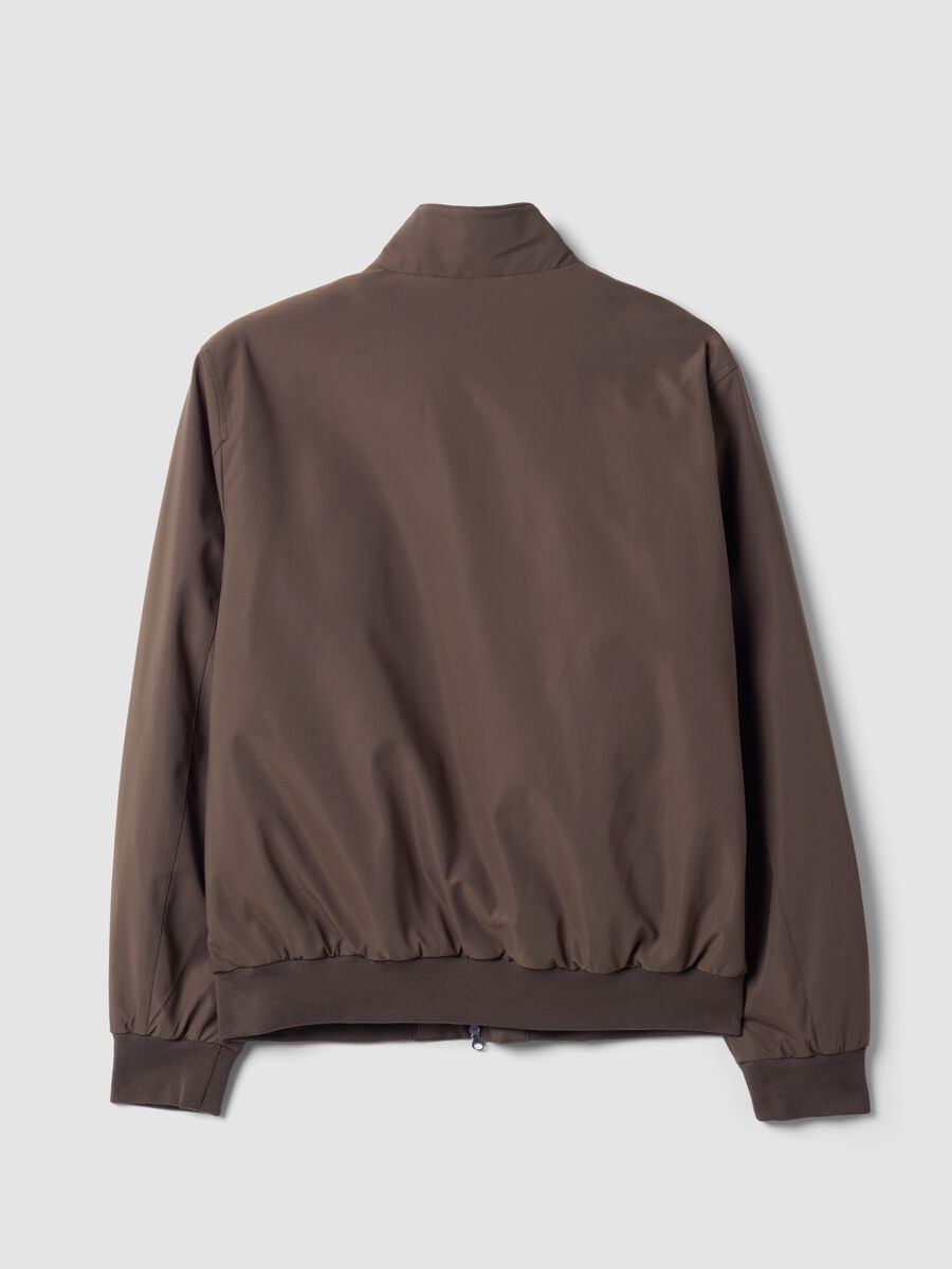 Green padded jacket in a regular fit with zip and high collar_1