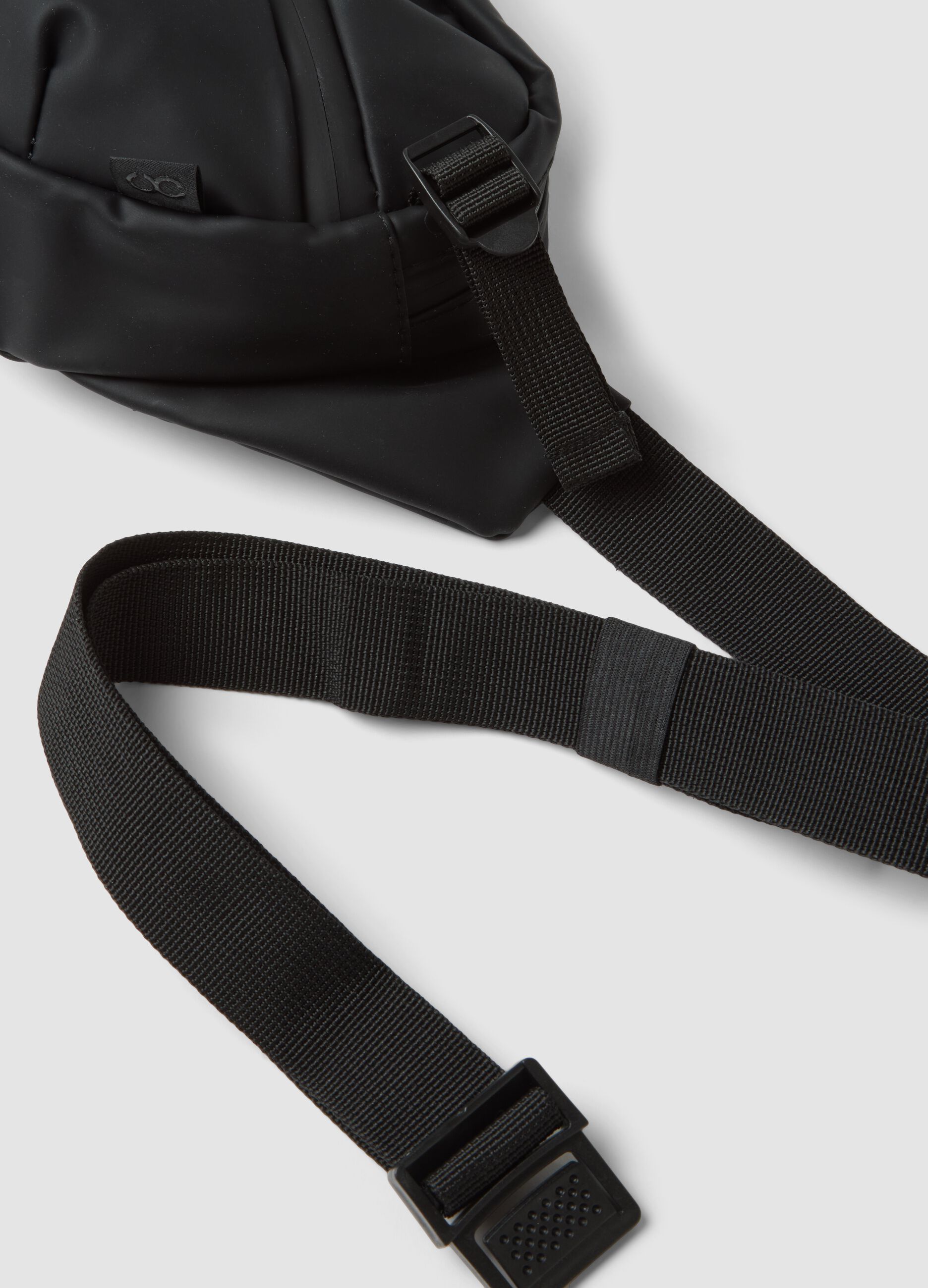 Black water-repellent bum bag with zipped pockets and adjustable belt