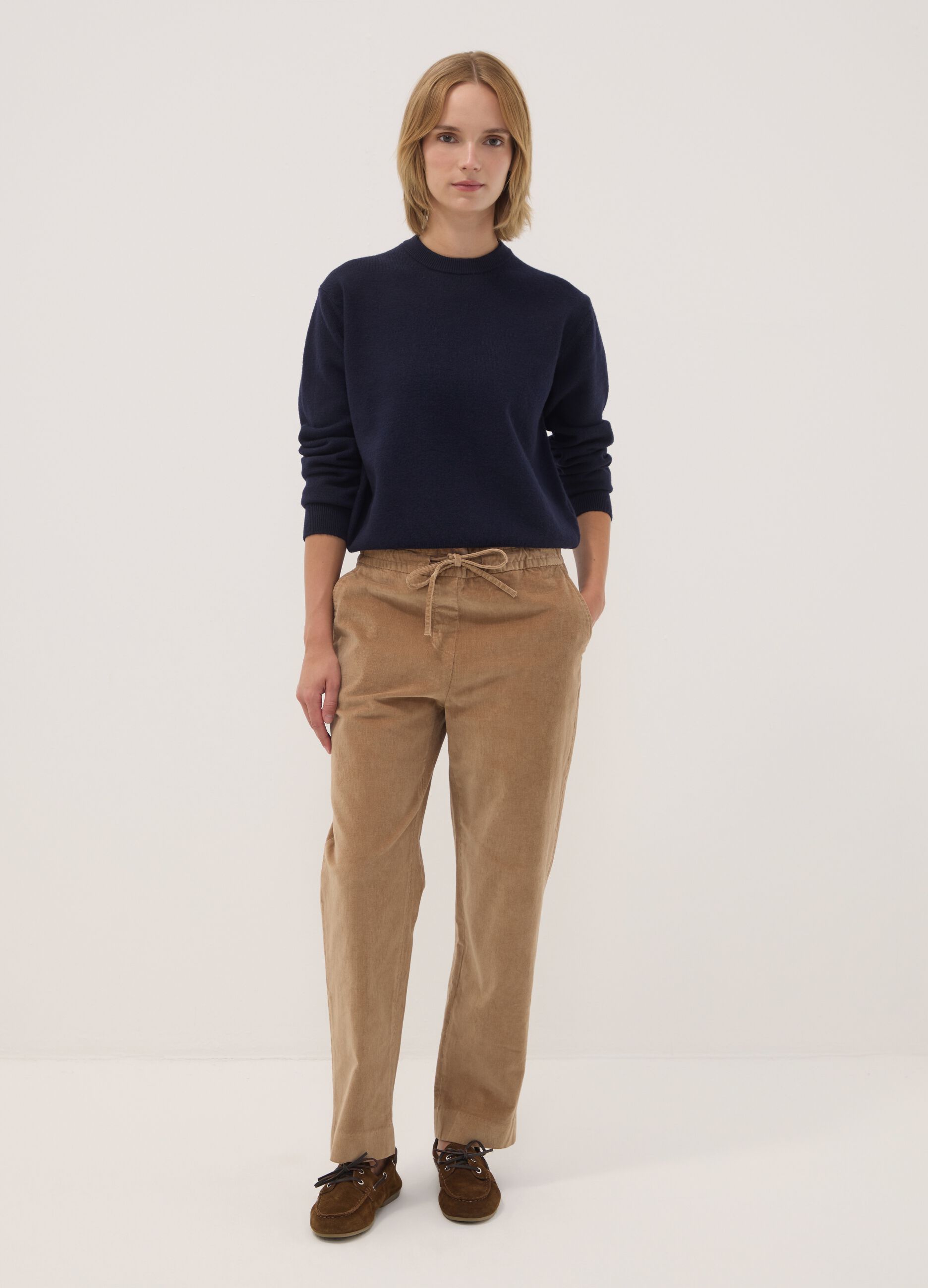 Beige ribbed stretch cotton trousers with elasticated waistband
