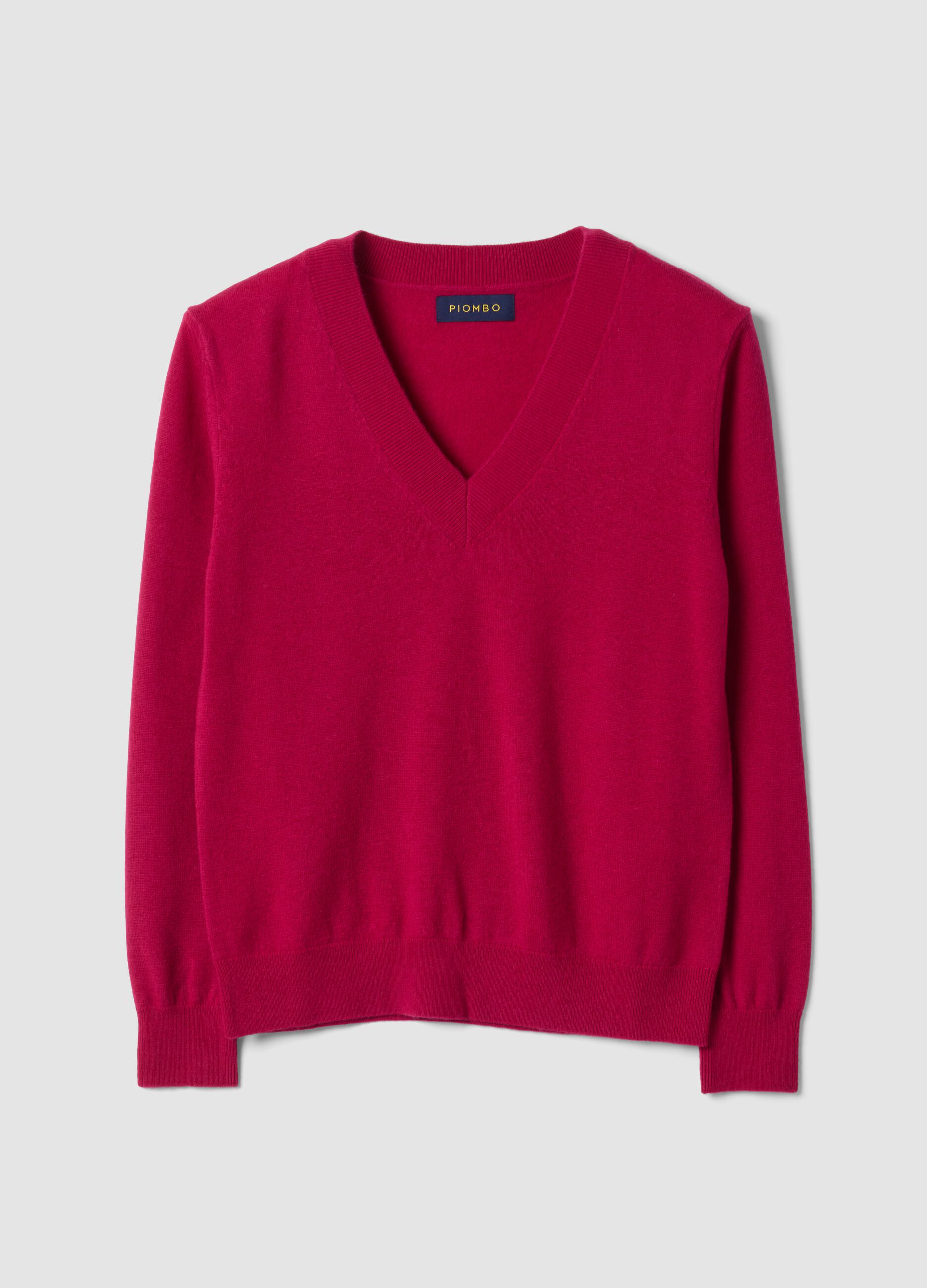 Maglia rossa in pura lana con scollo profondo a V
