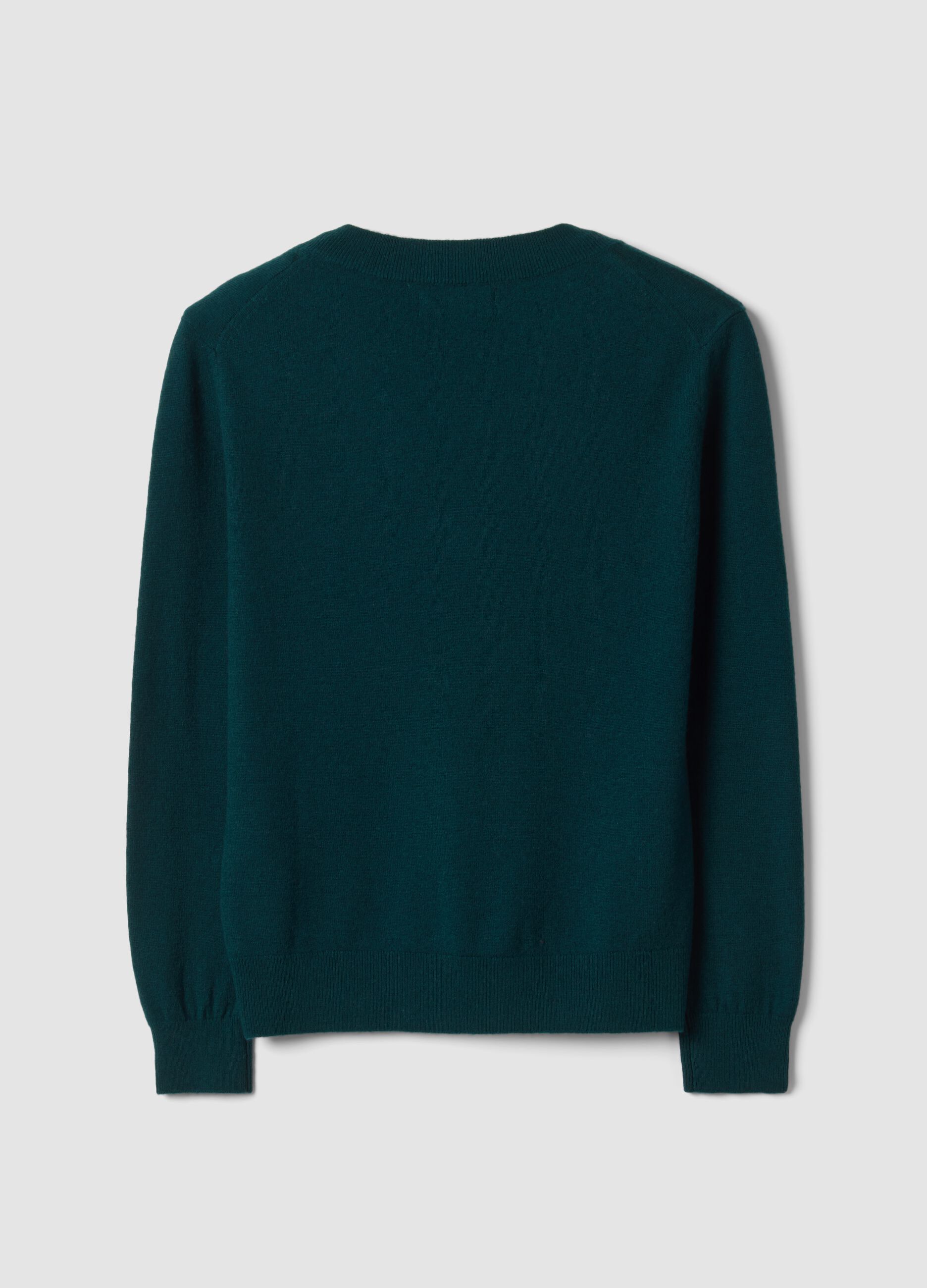 Maglia verde in pura lana con scollo profondo a V