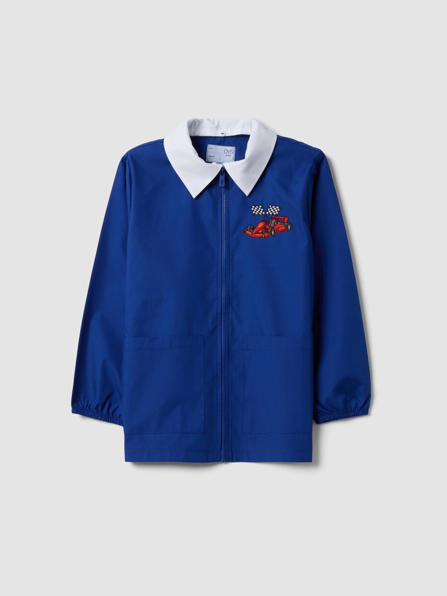 Customisable blue school apron with zip and go-kart embroidery for boys_0
