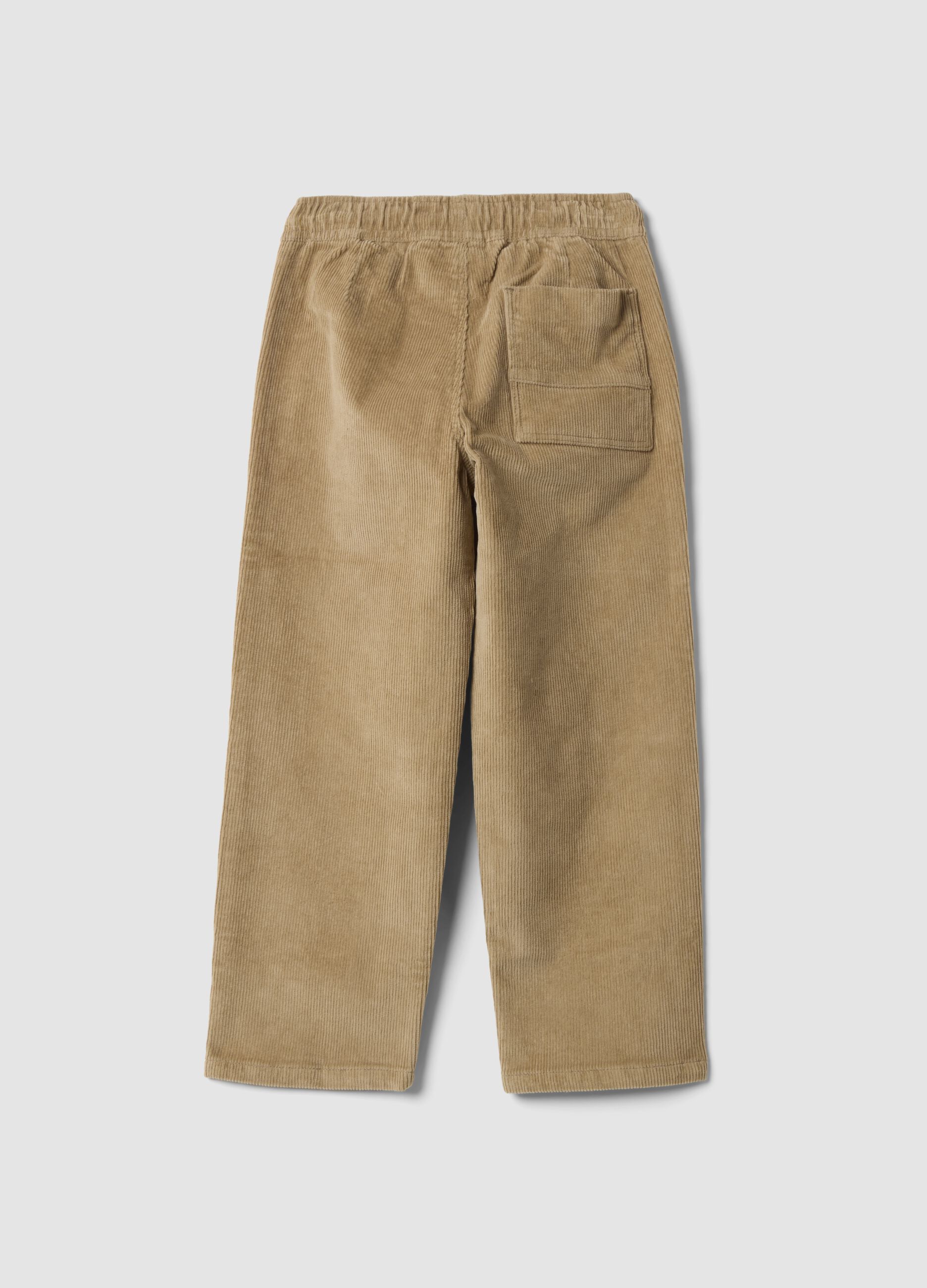 Pantaloni beige in cotone elasticizzato a coste