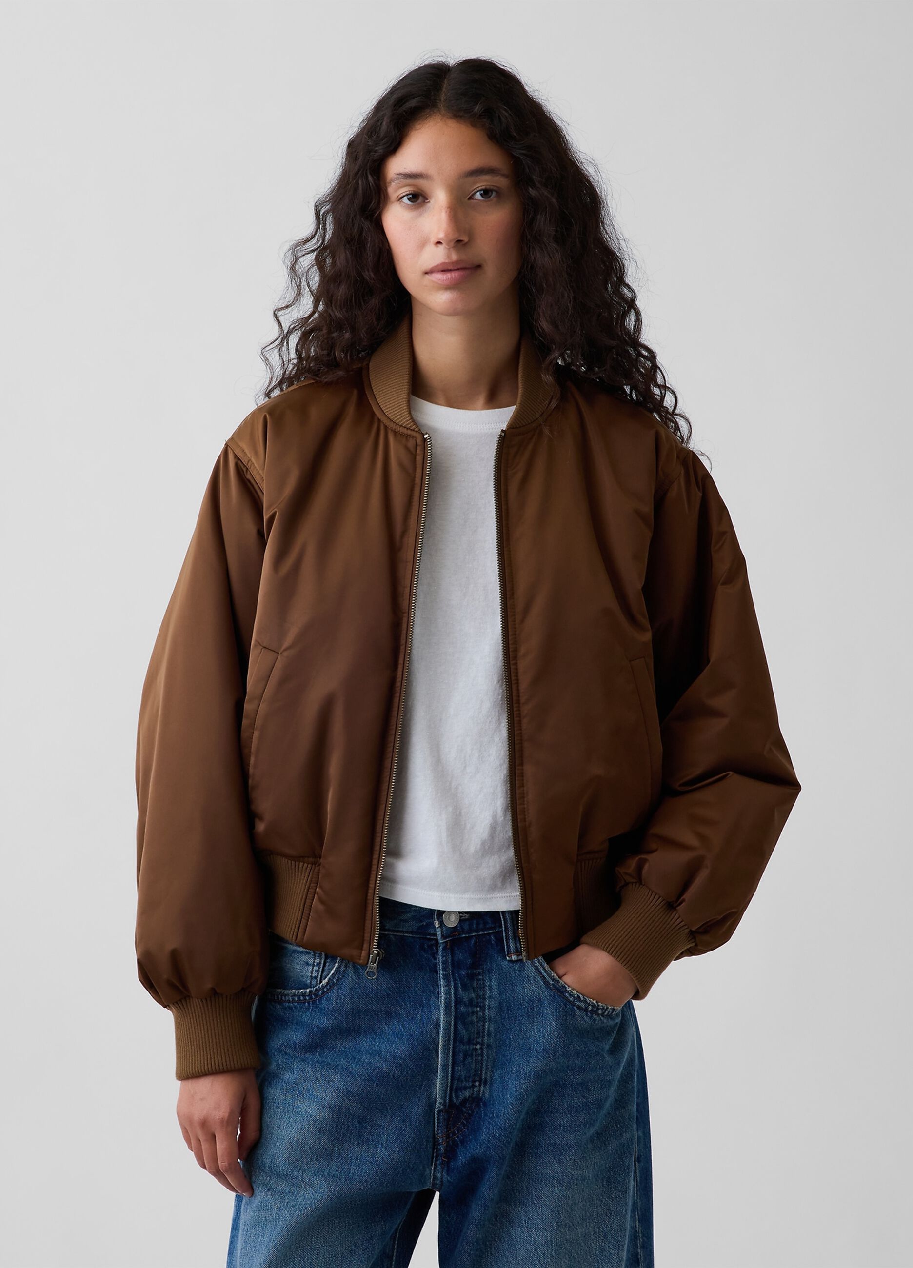 Light brown bomber jacket with zip and ribbed cuffs