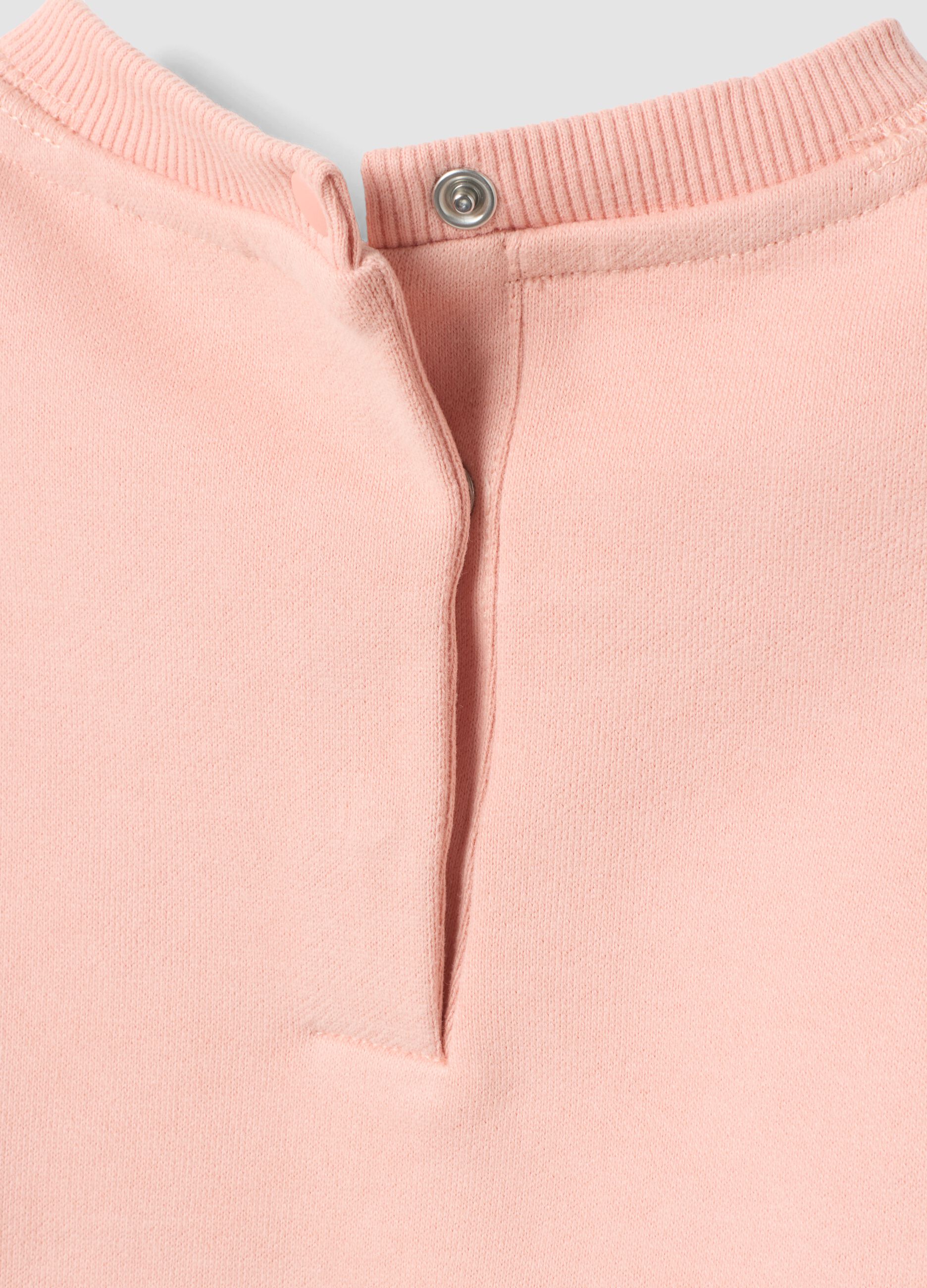 Felpa rosa chiaro in puro cotone con fiocchi e girocollo
