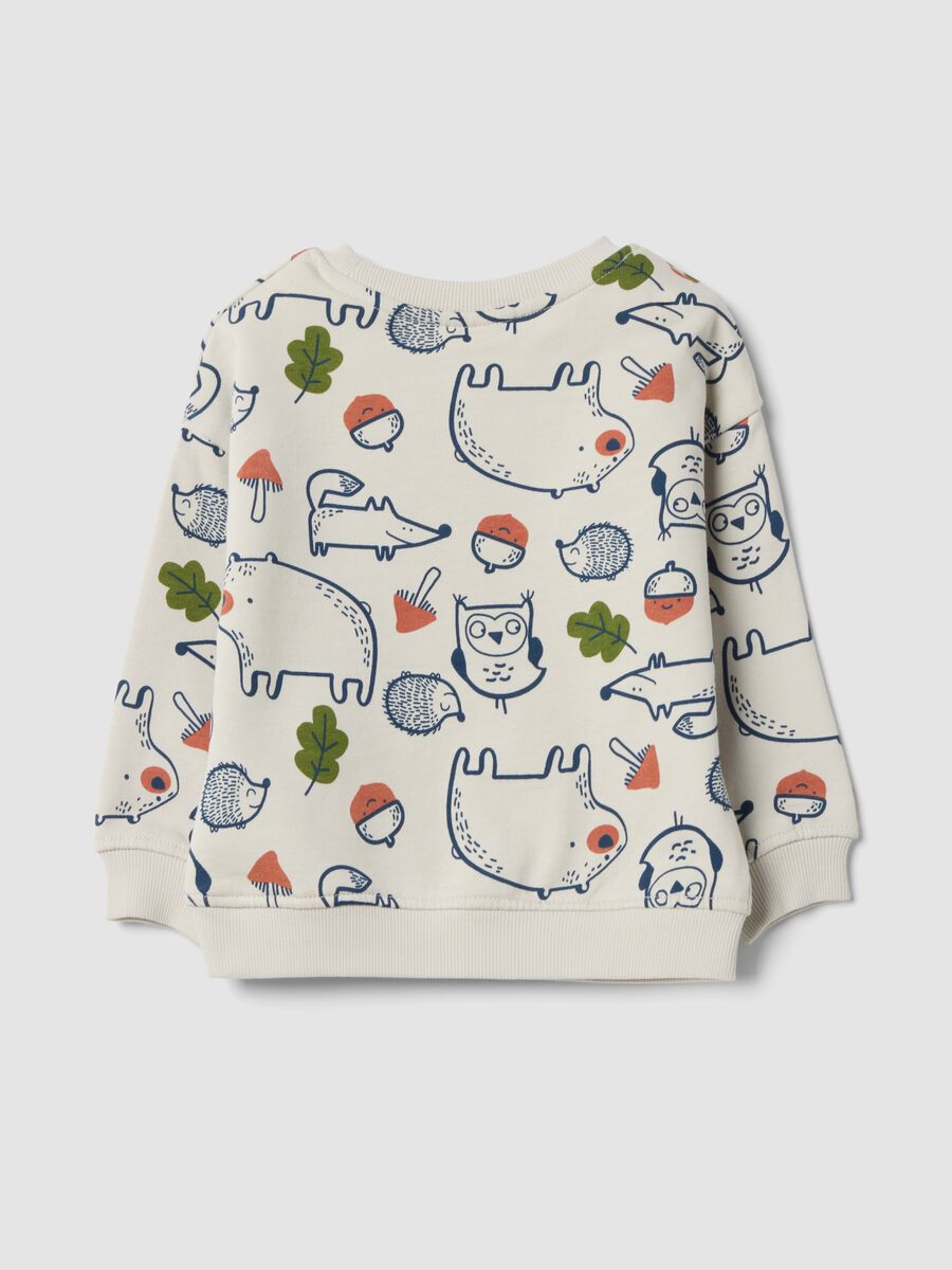 Felpa beige in puro cotone con girocollo e stampa animali over fit_1