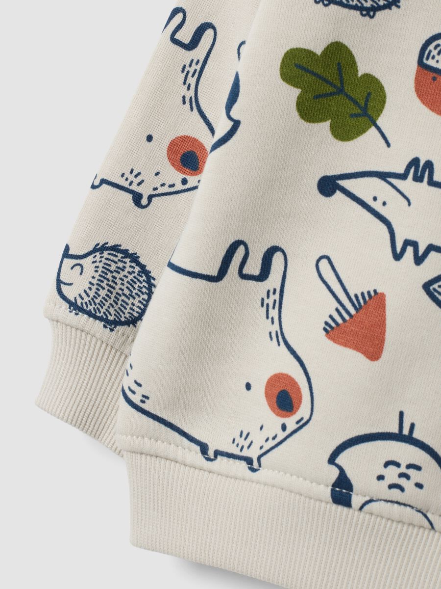 Felpa beige in puro cotone con girocollo e stampa animali over fit_3