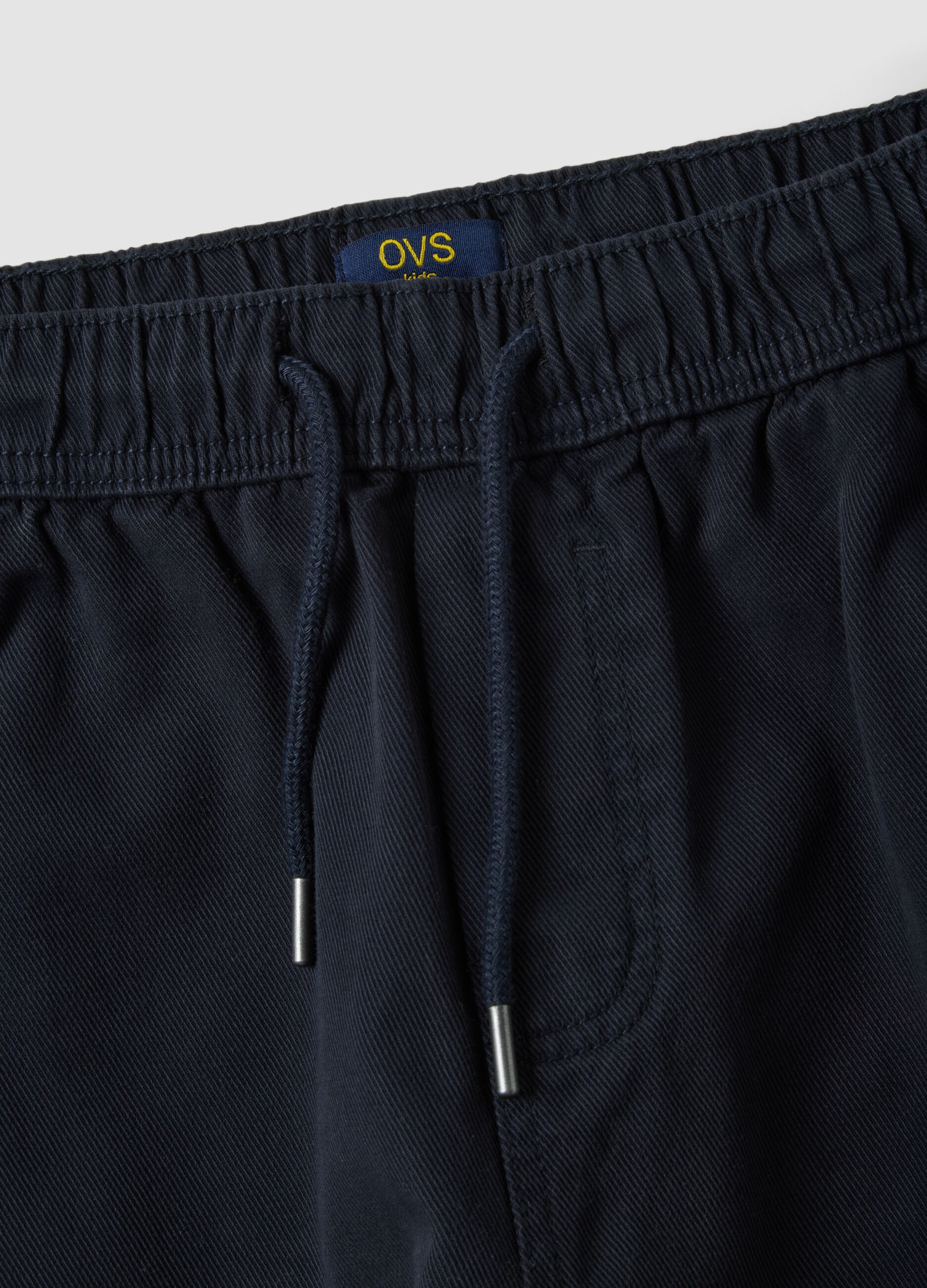Blue stretch cotton trousers with elasticated waistband, comfort fit