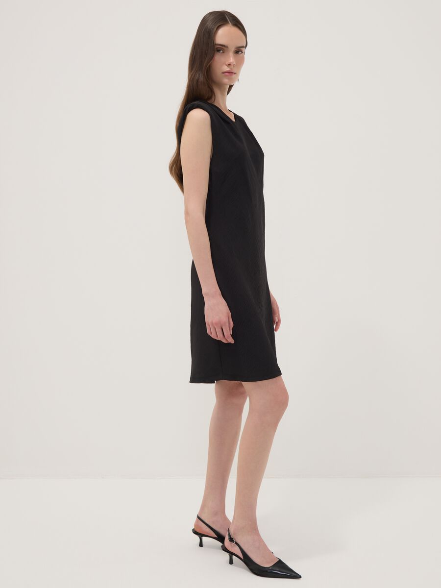 Black fitted dress with ruched detailing_1