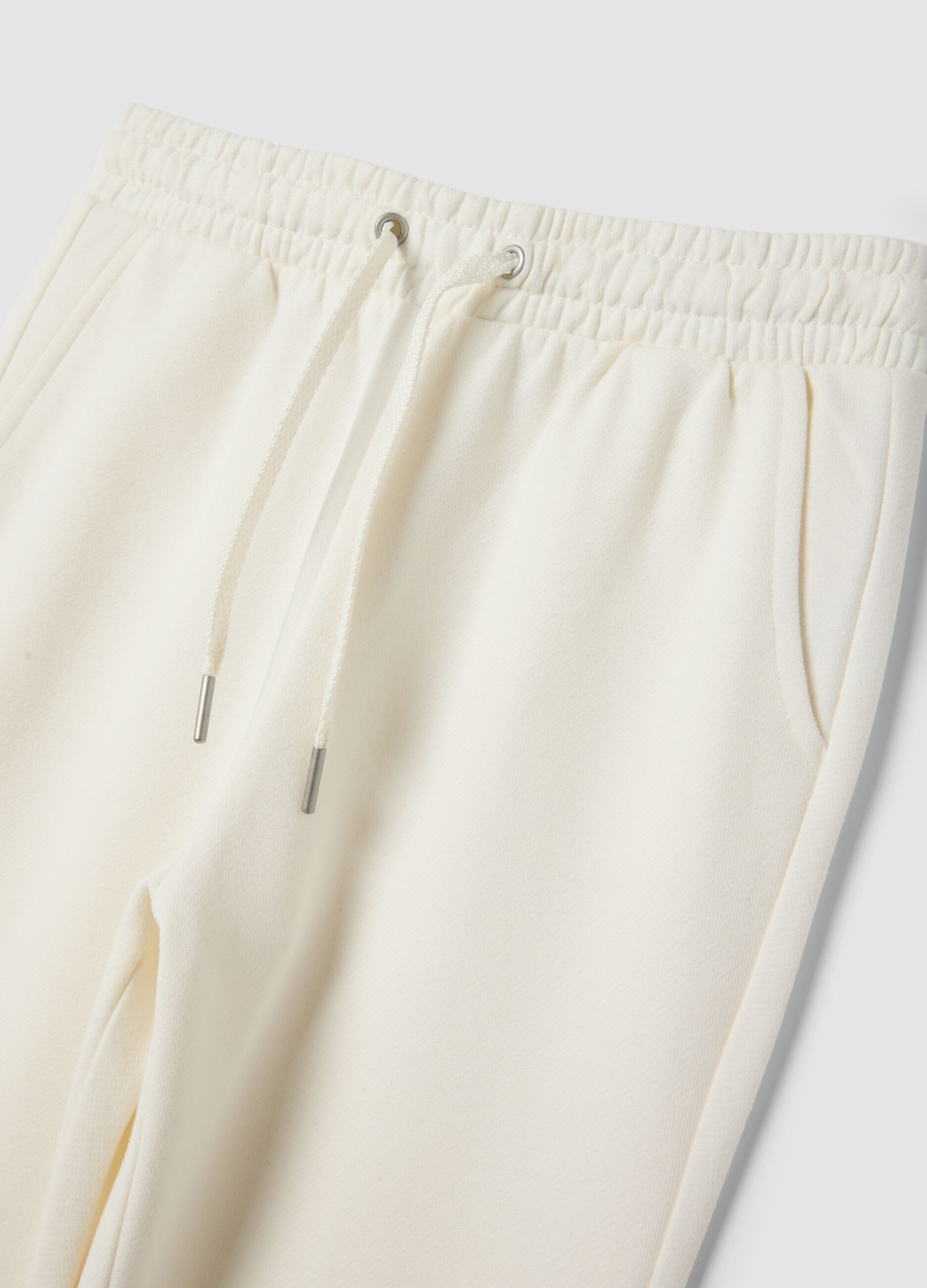 White flare trousers in pure organic cotton