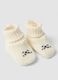 White baby booties in pure knitted cotton_1