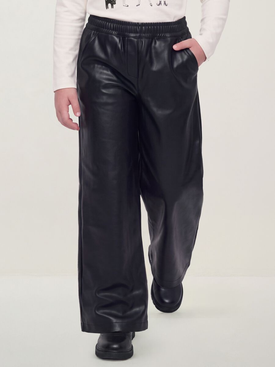 Pantaloni neri wide leg con vita elasticizzata per bambina_1