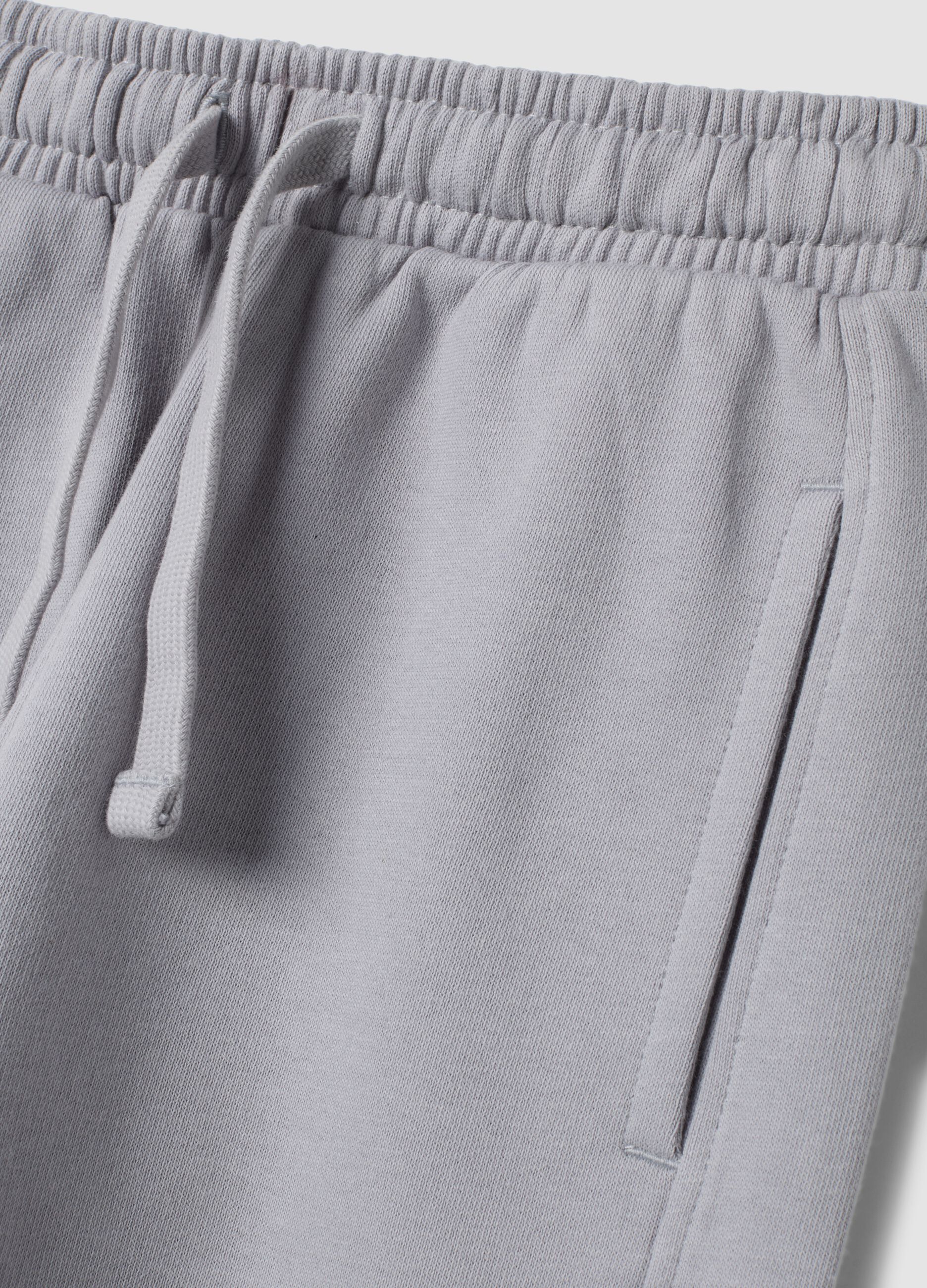 Grey organic cotton jogger trousers with print