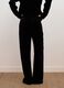 Pantaloni neri flare in tessuto elasticizzato_2