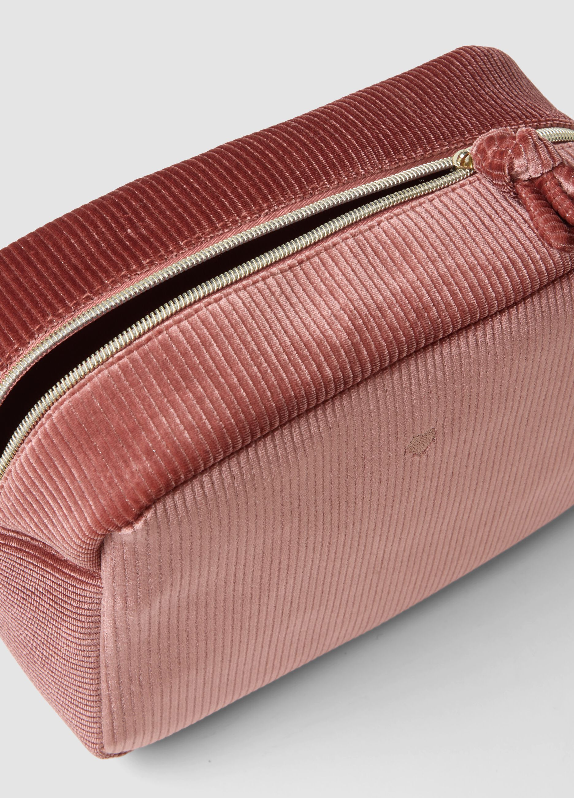 Pink ribbed stretch-fabric toiletry bag